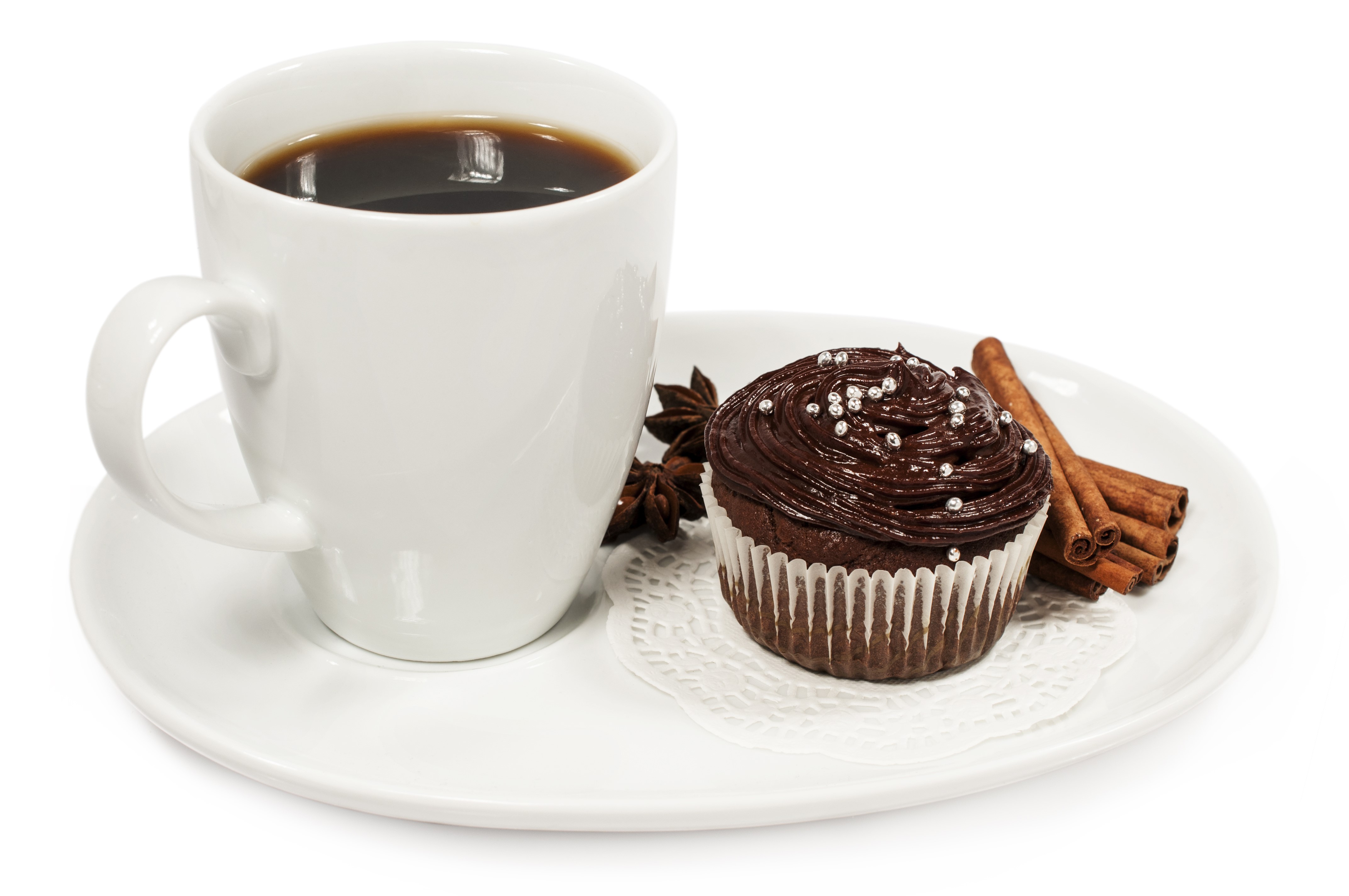 Coffee cup with chocolate cupcake and cinnamon sticks HD Wallpaper