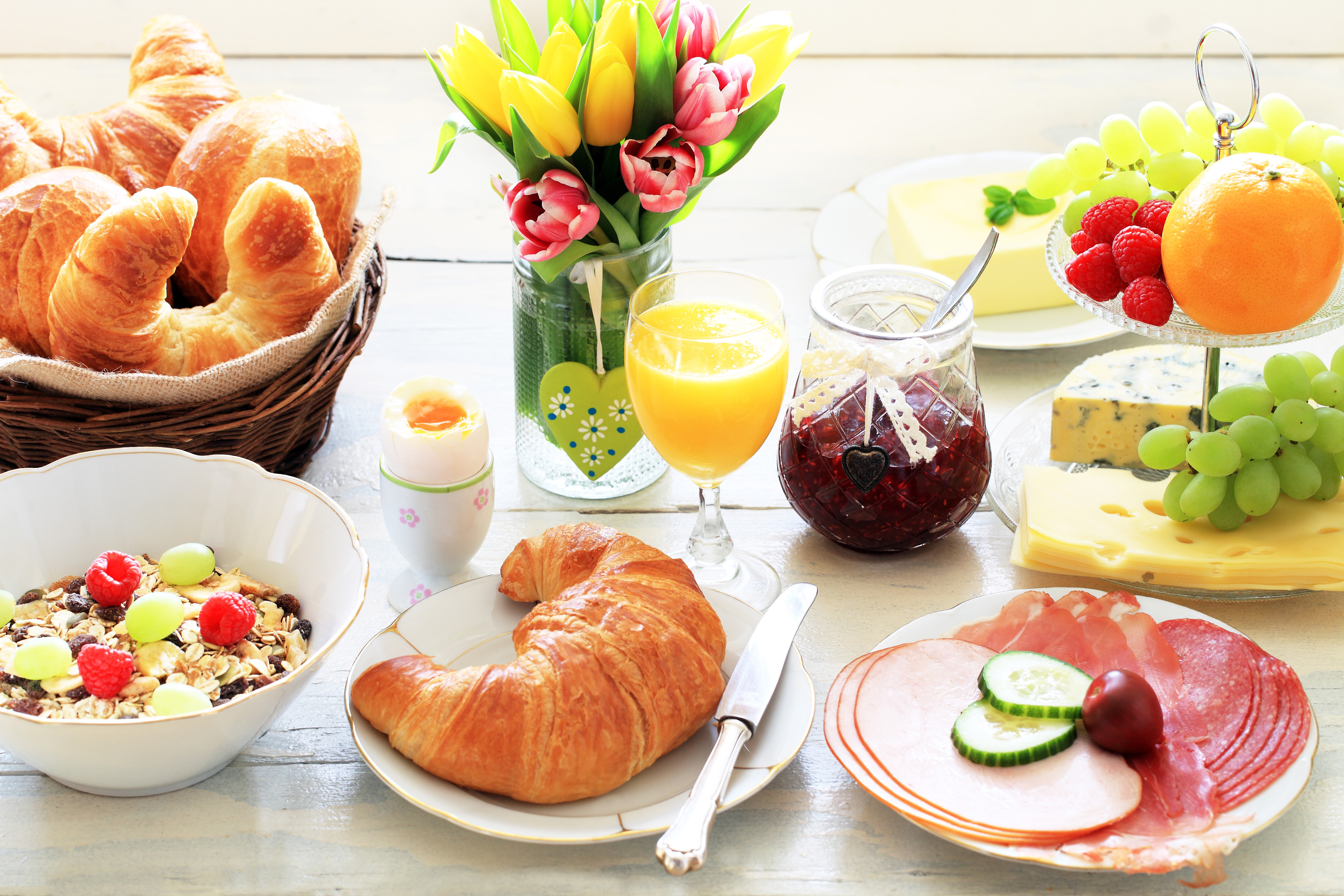 Breakfast with Croissants, Fruit, and Tulips HD Wallpaper