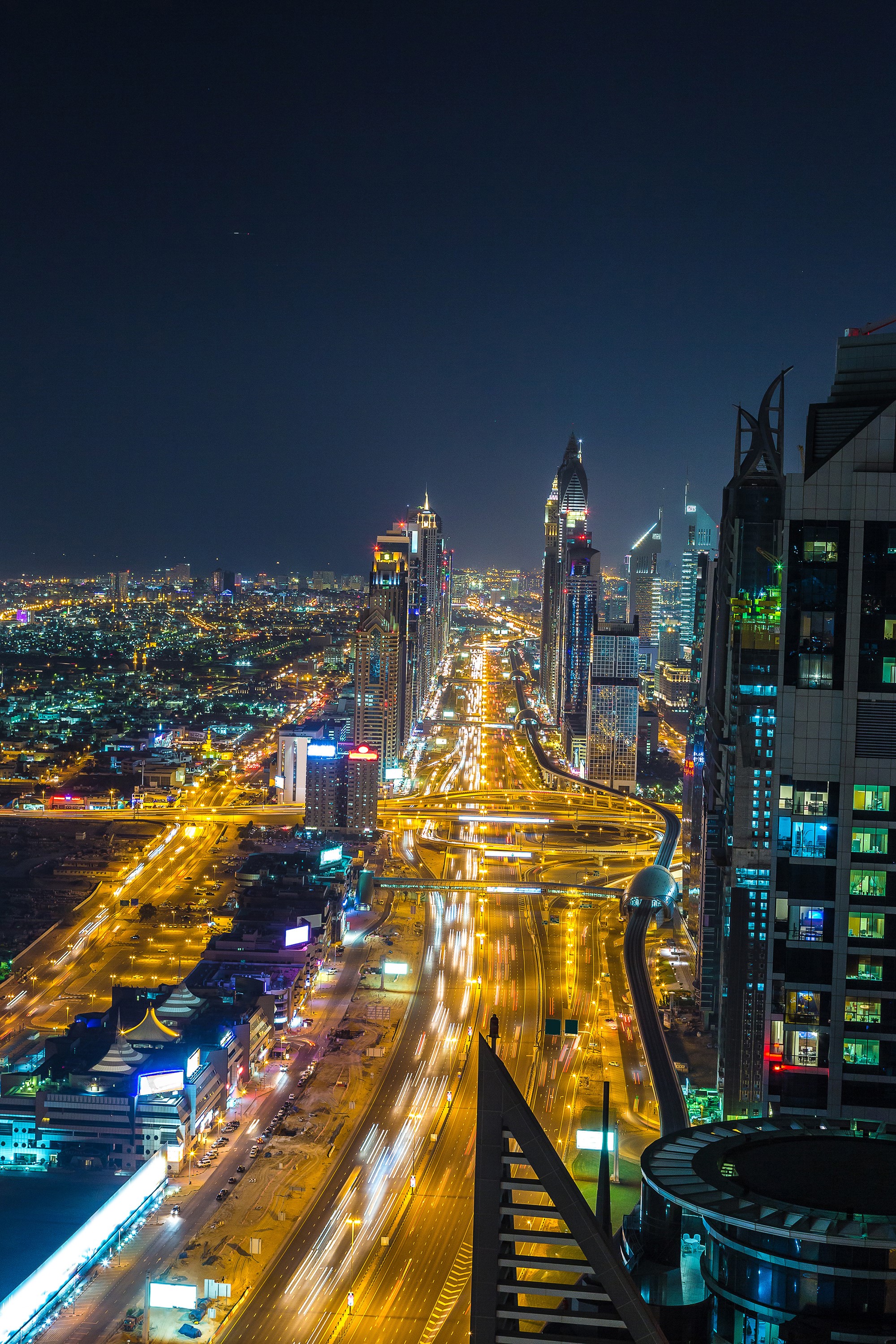 Dubai Megapolis at Night with Highways and Skyscrapers HD Phone Wallpaper