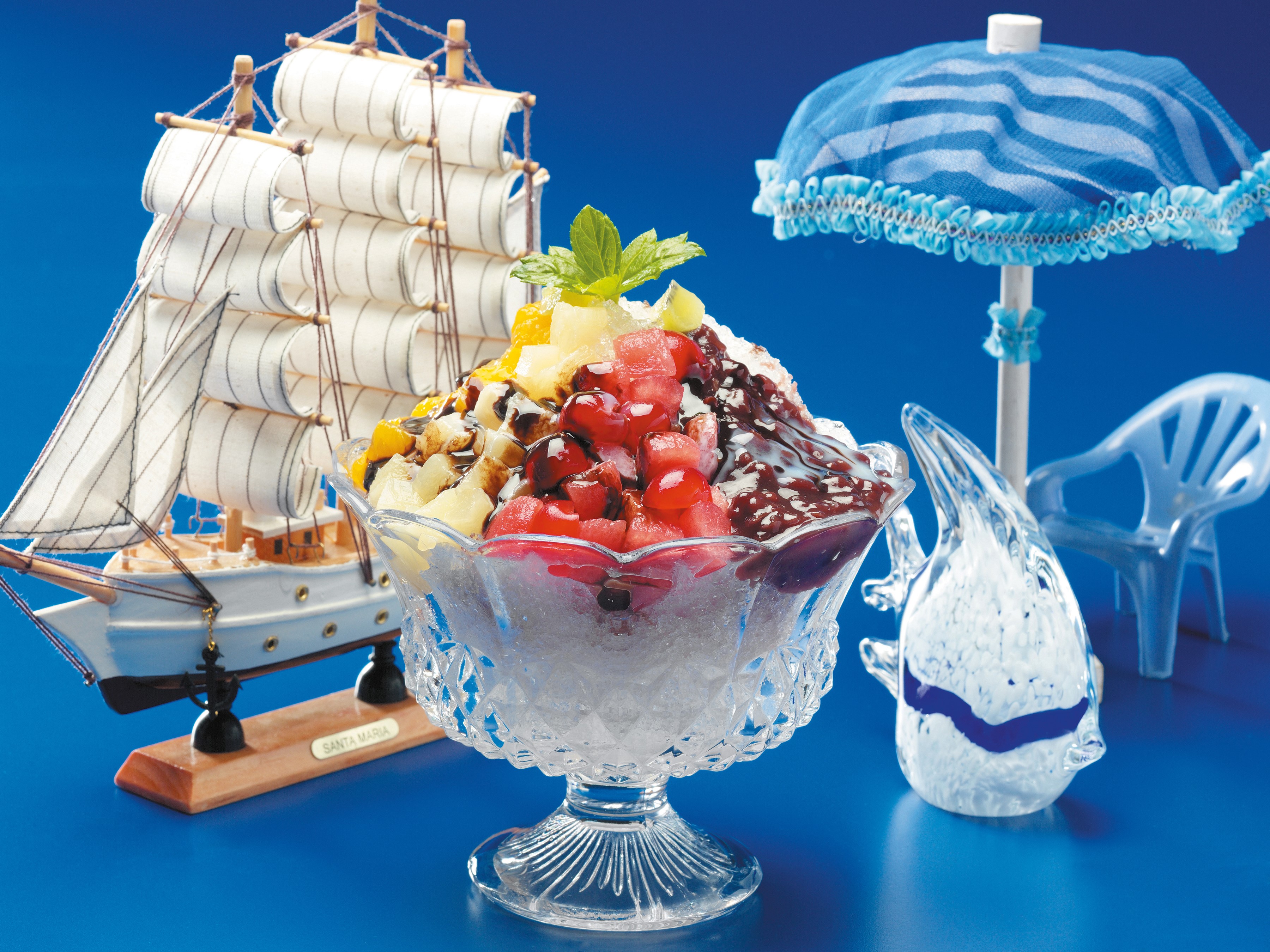 Fruit dessert with ship and umbrella HD Wallpaper