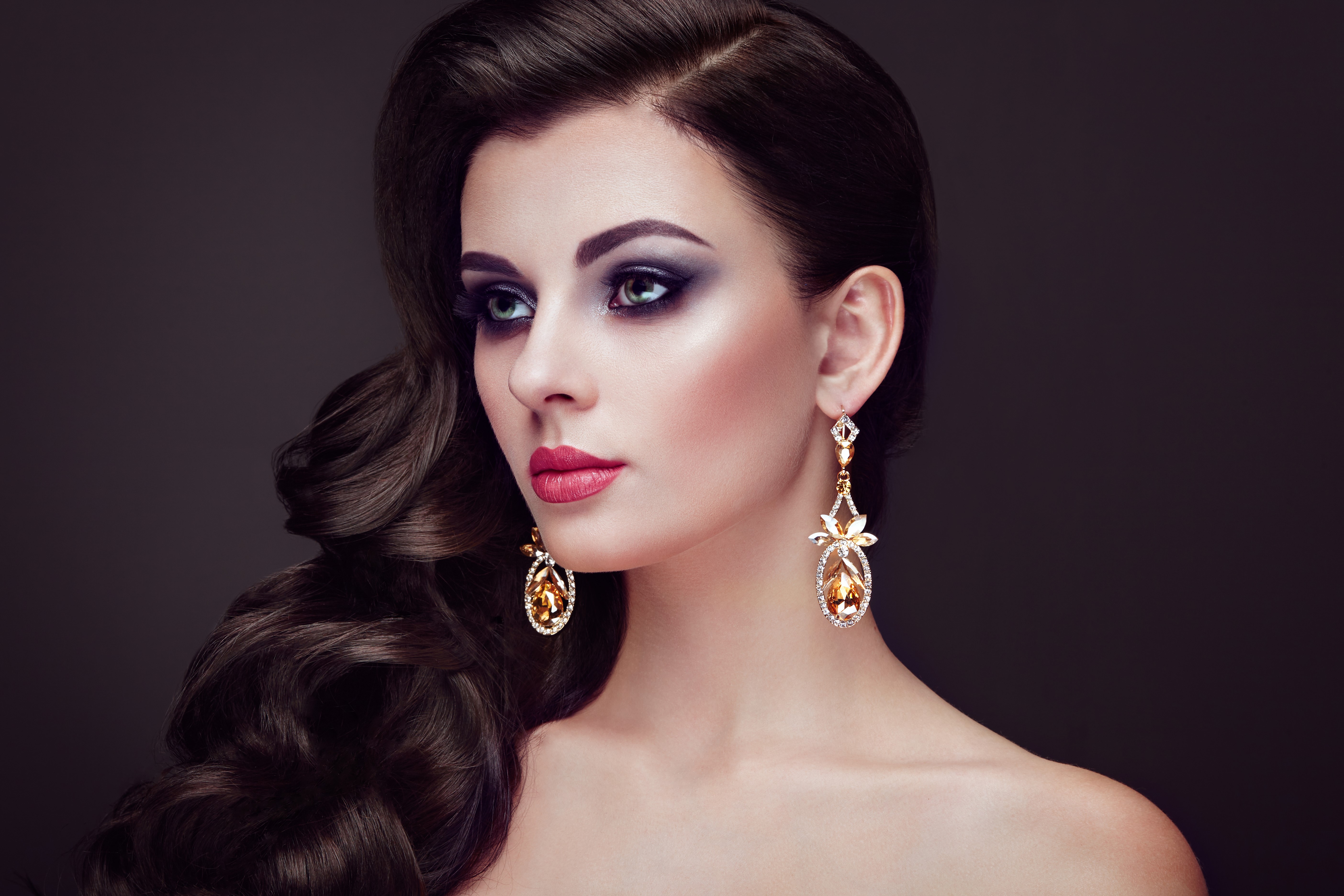 Beautiful woman with brown hair and earrings HD Wallpaper