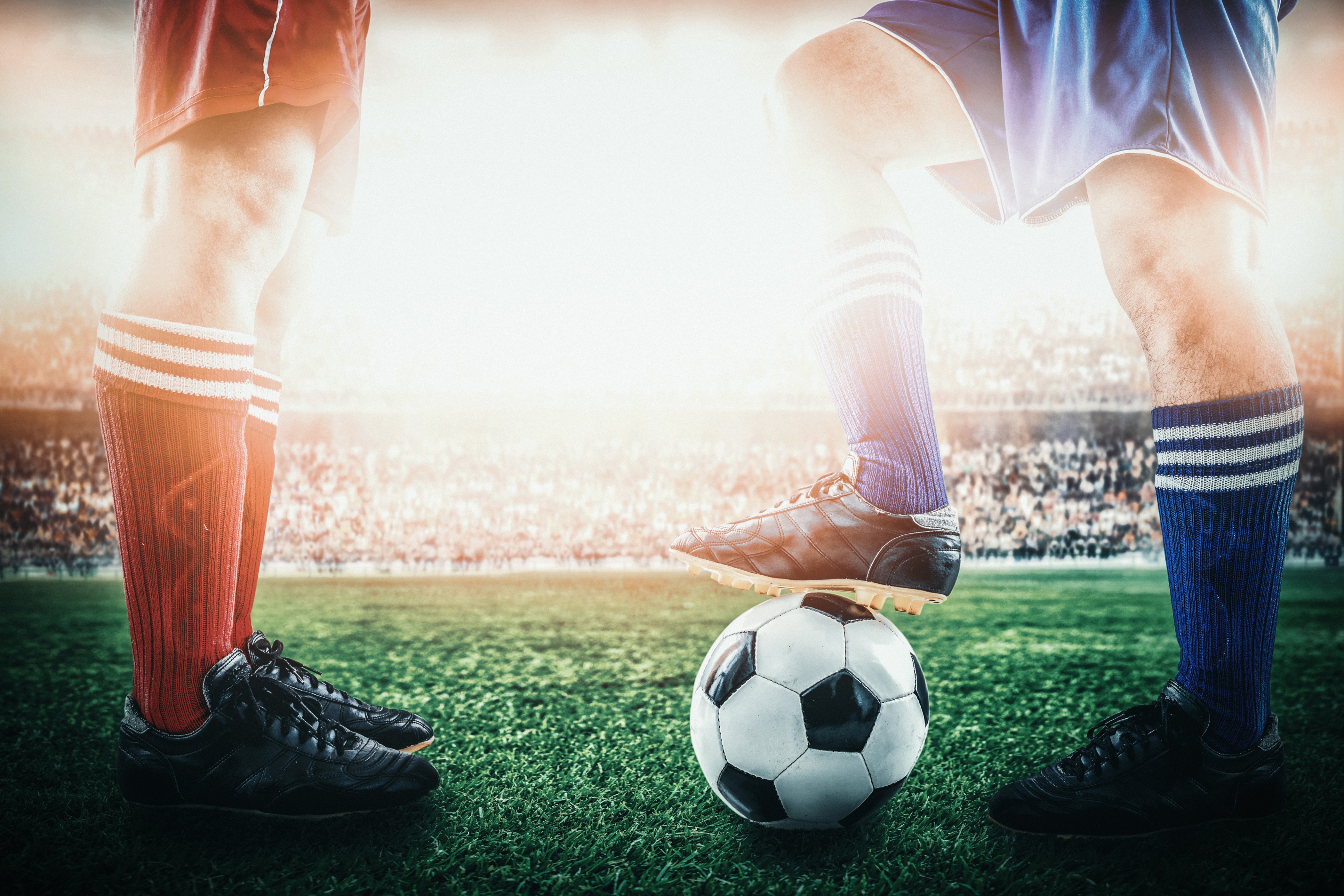 Soccer players with ball in stadium HD Wallpaper