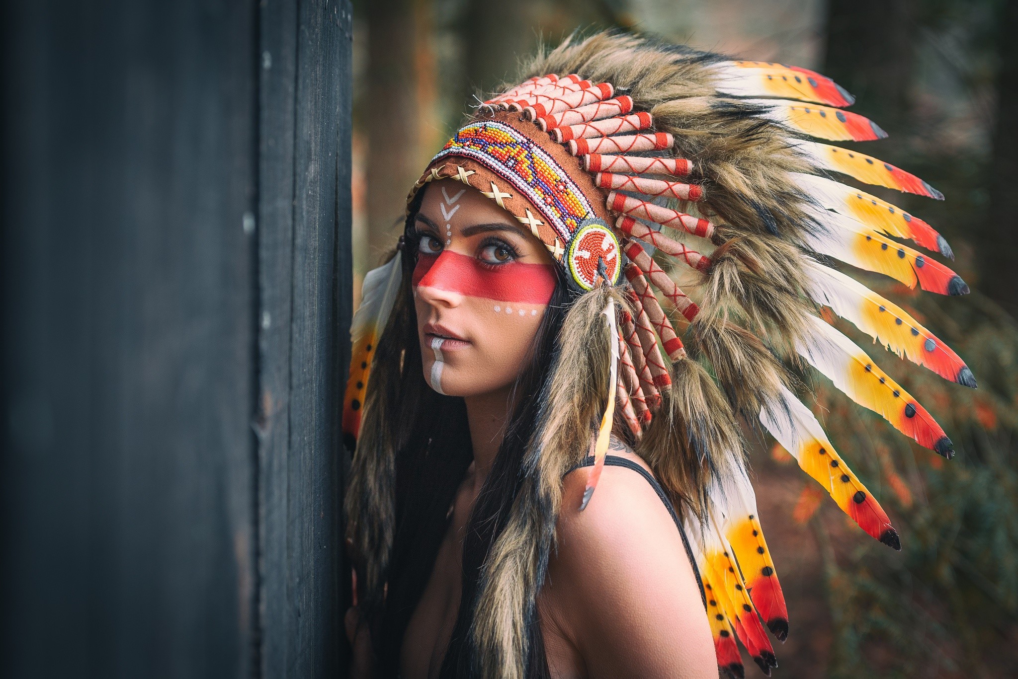 Woman with Native American Headdress and Face Paint HD Wallpaper