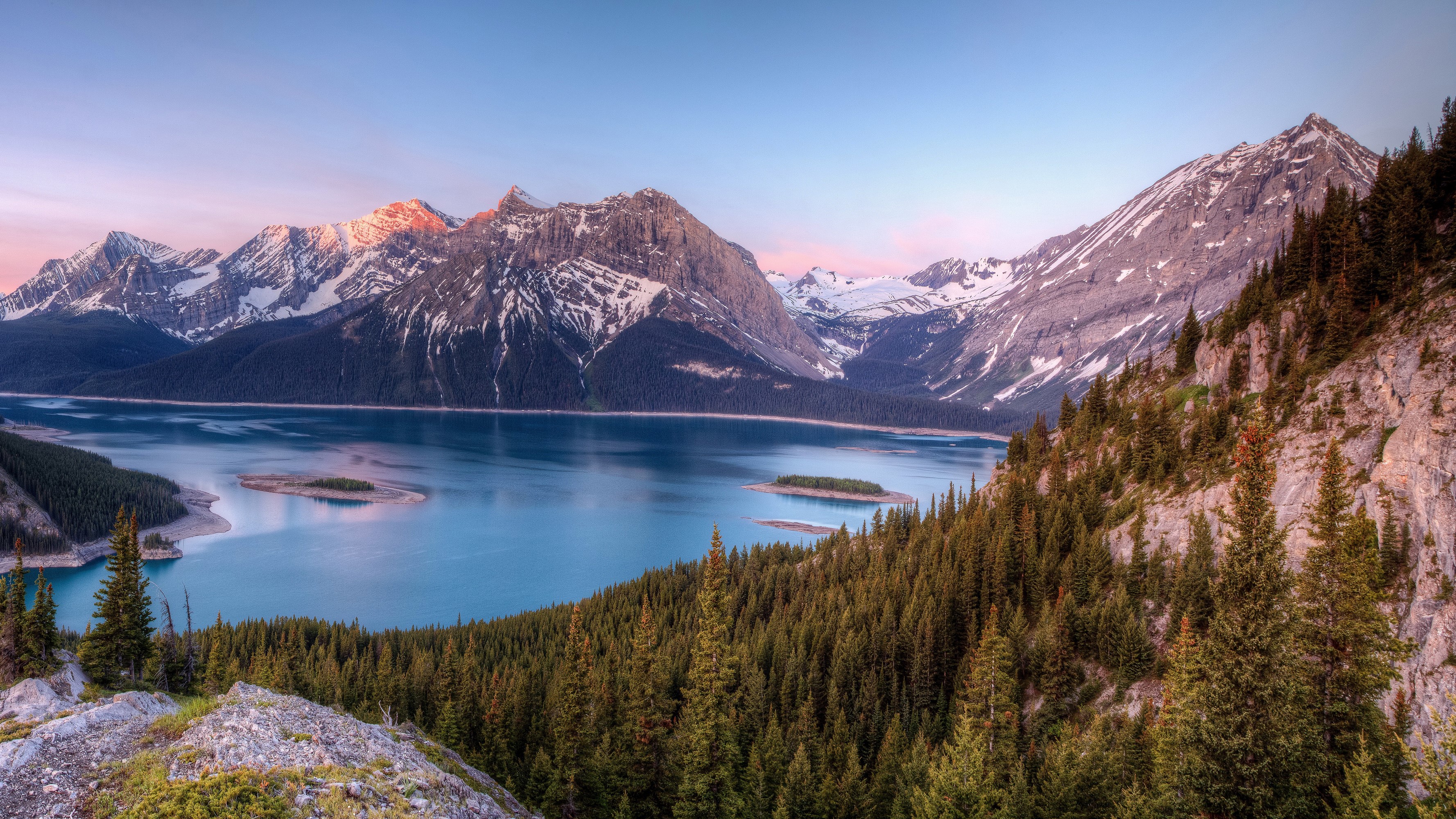 Mountains and lake with pine forests at sunrise HD Wallpaper