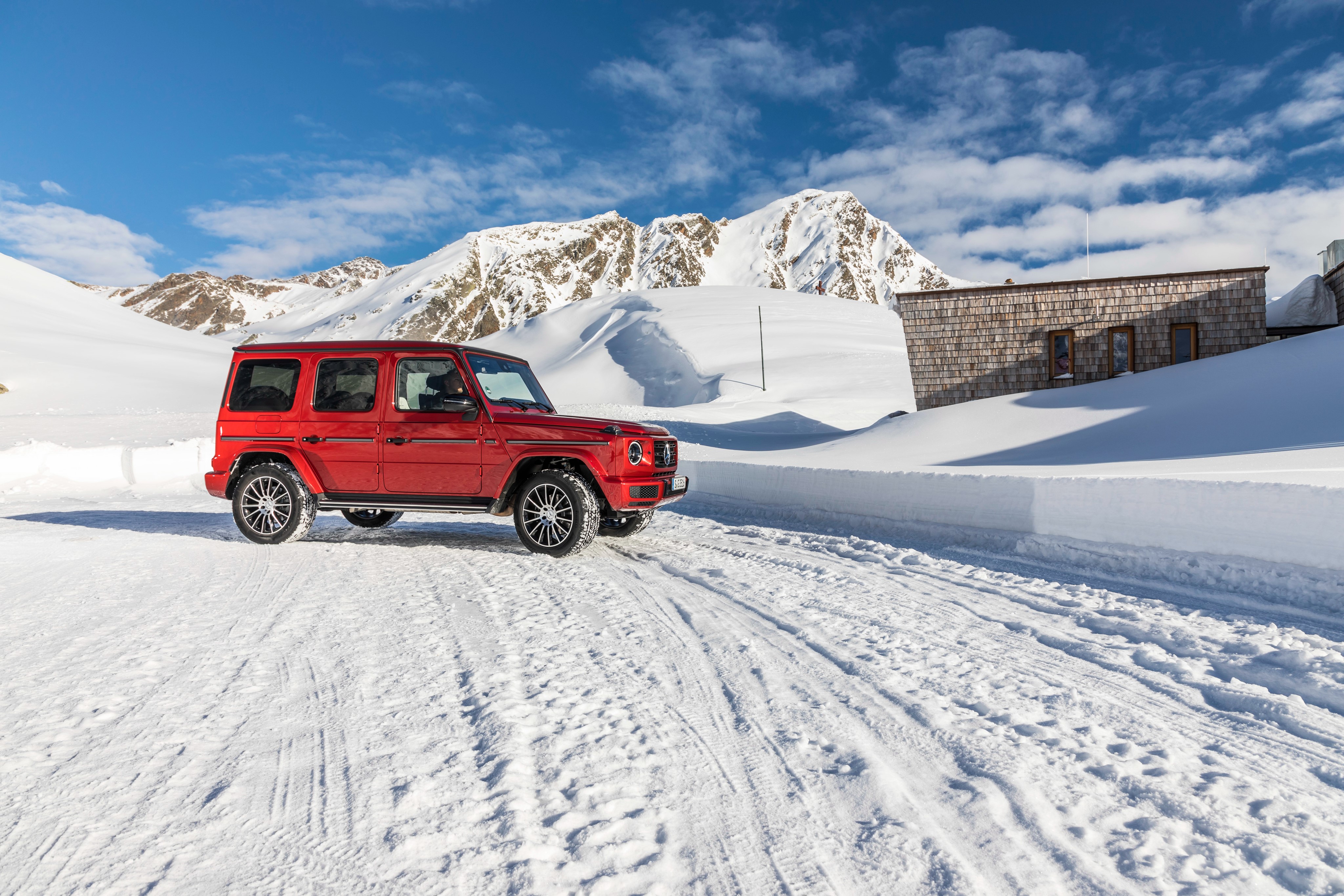 Red Mercedes-Benz G 350 d AMG Line SUV in Snow HD Wallpaper