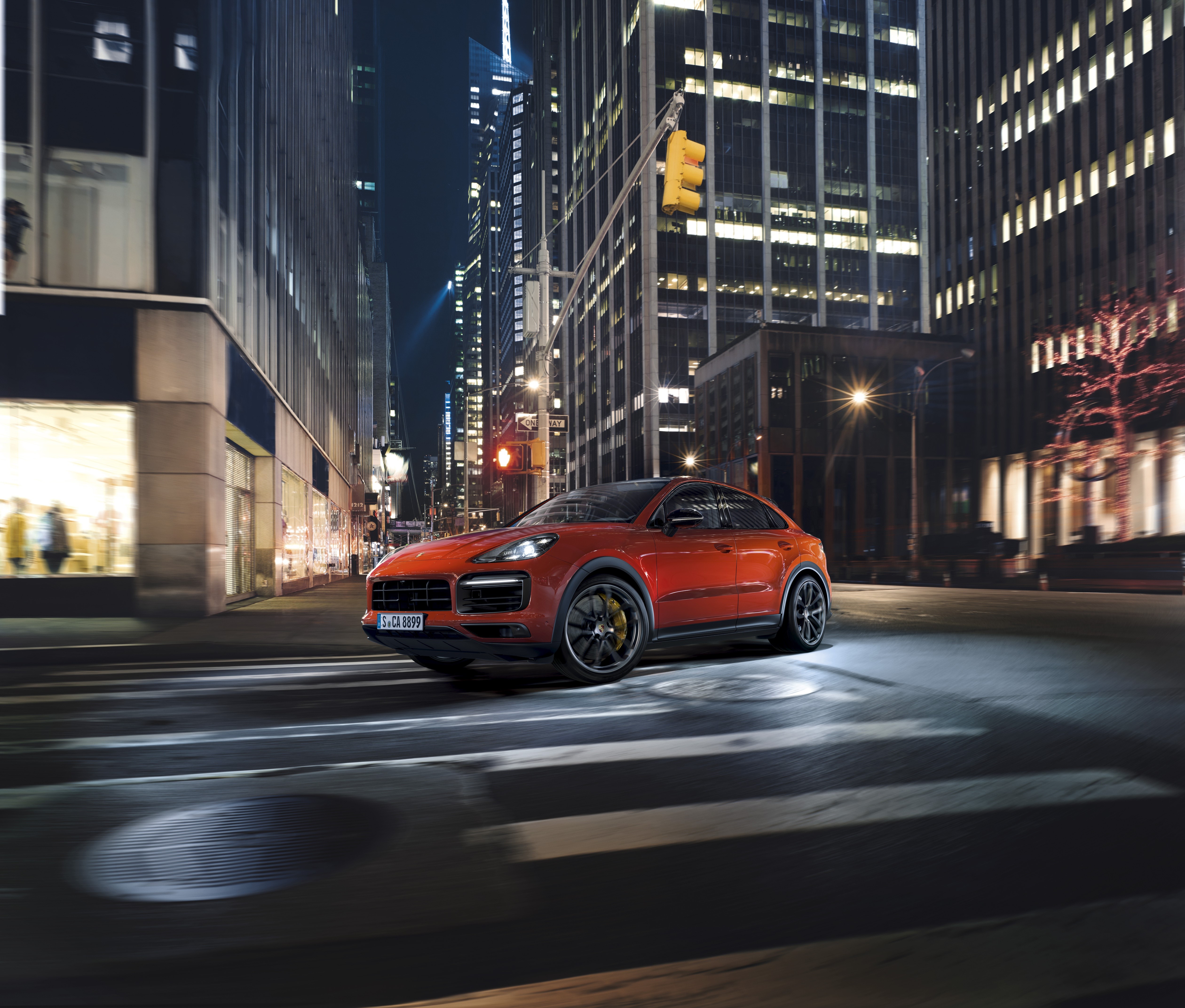 Orange Porsche Cayenne Turbo 2019 driving at night HD Wallpaper