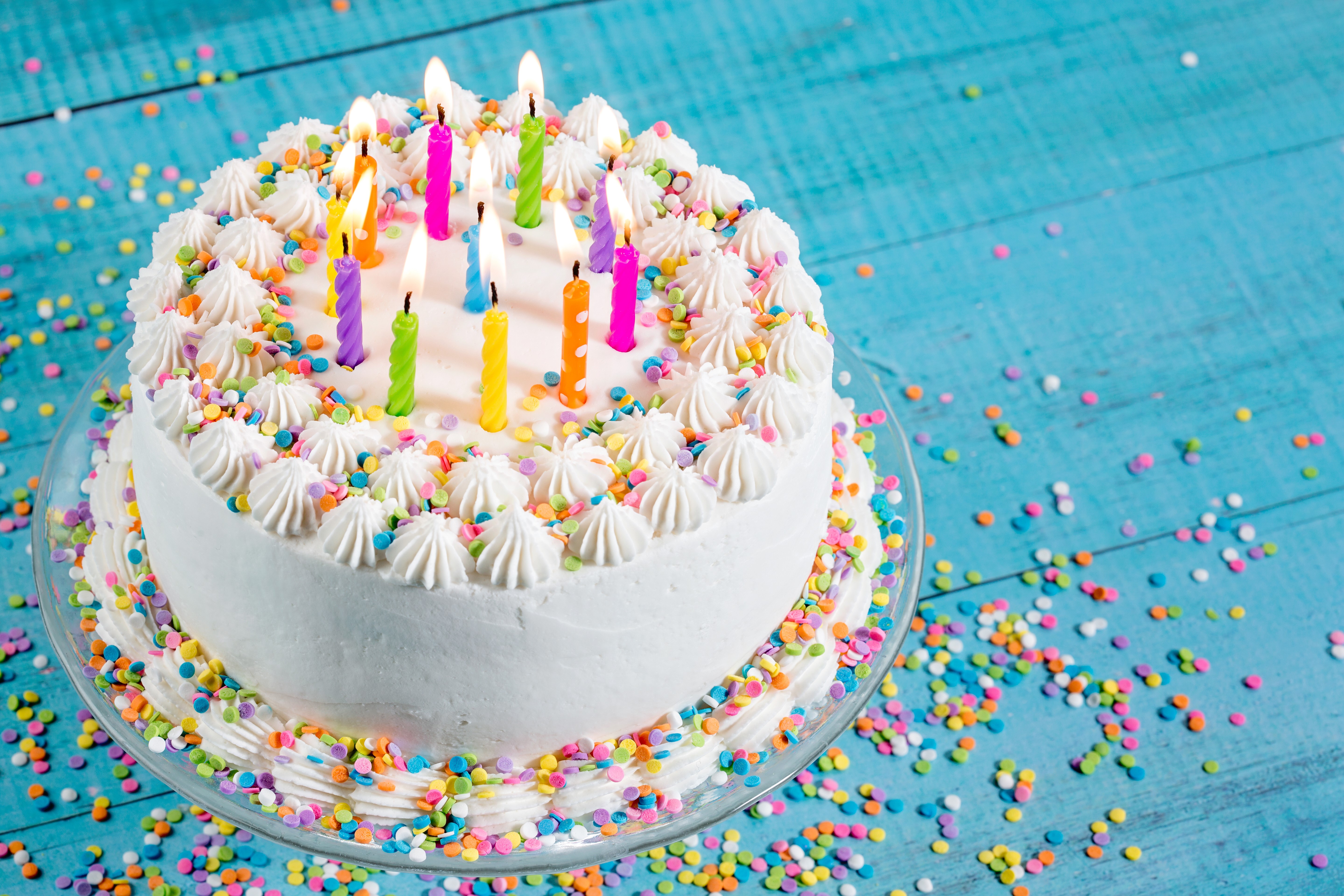 Birthday cake with lit candles and sprinkles HD Wallpaper