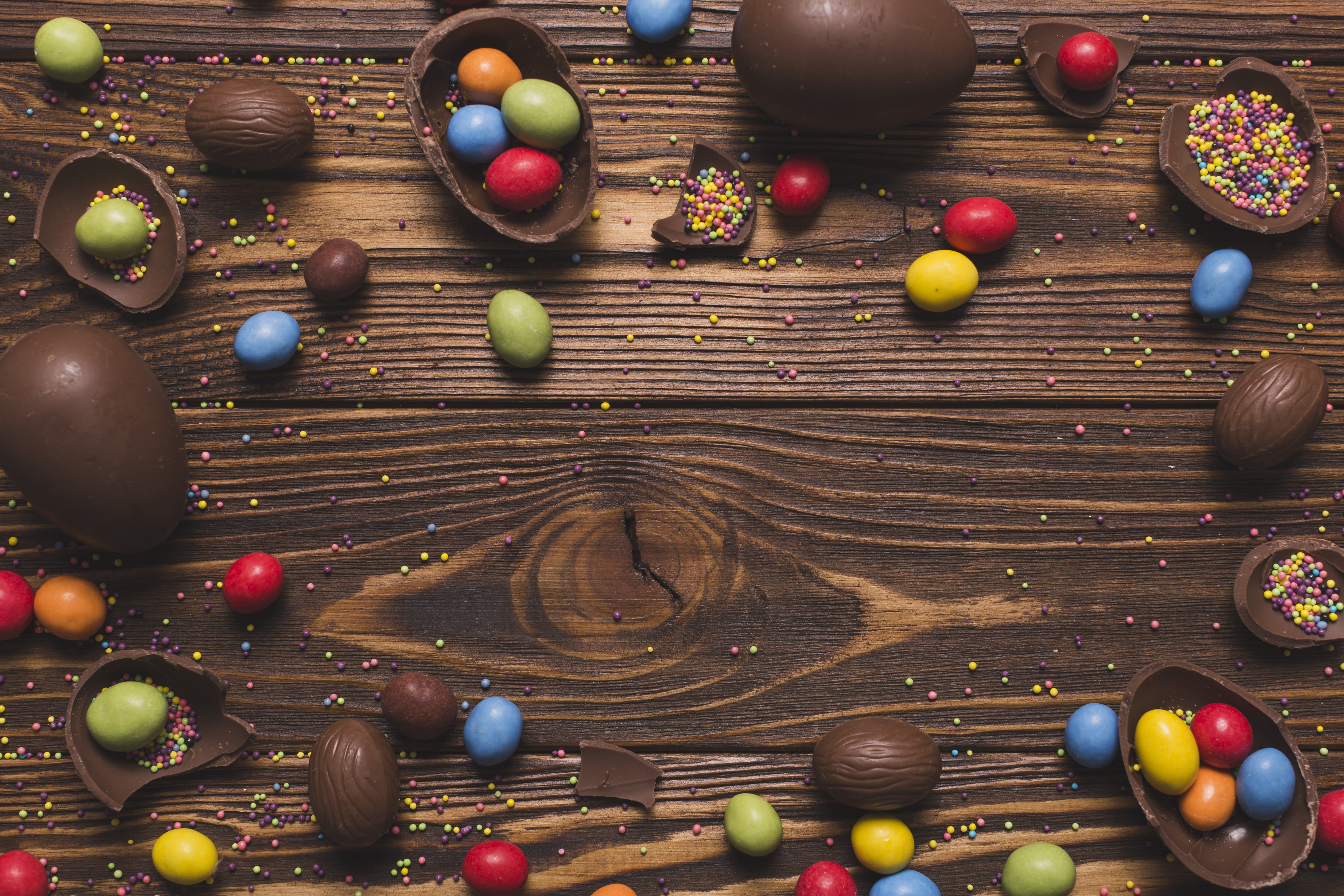 Easter Chocolate Eggs and Candies on Wood HD Wallpaper