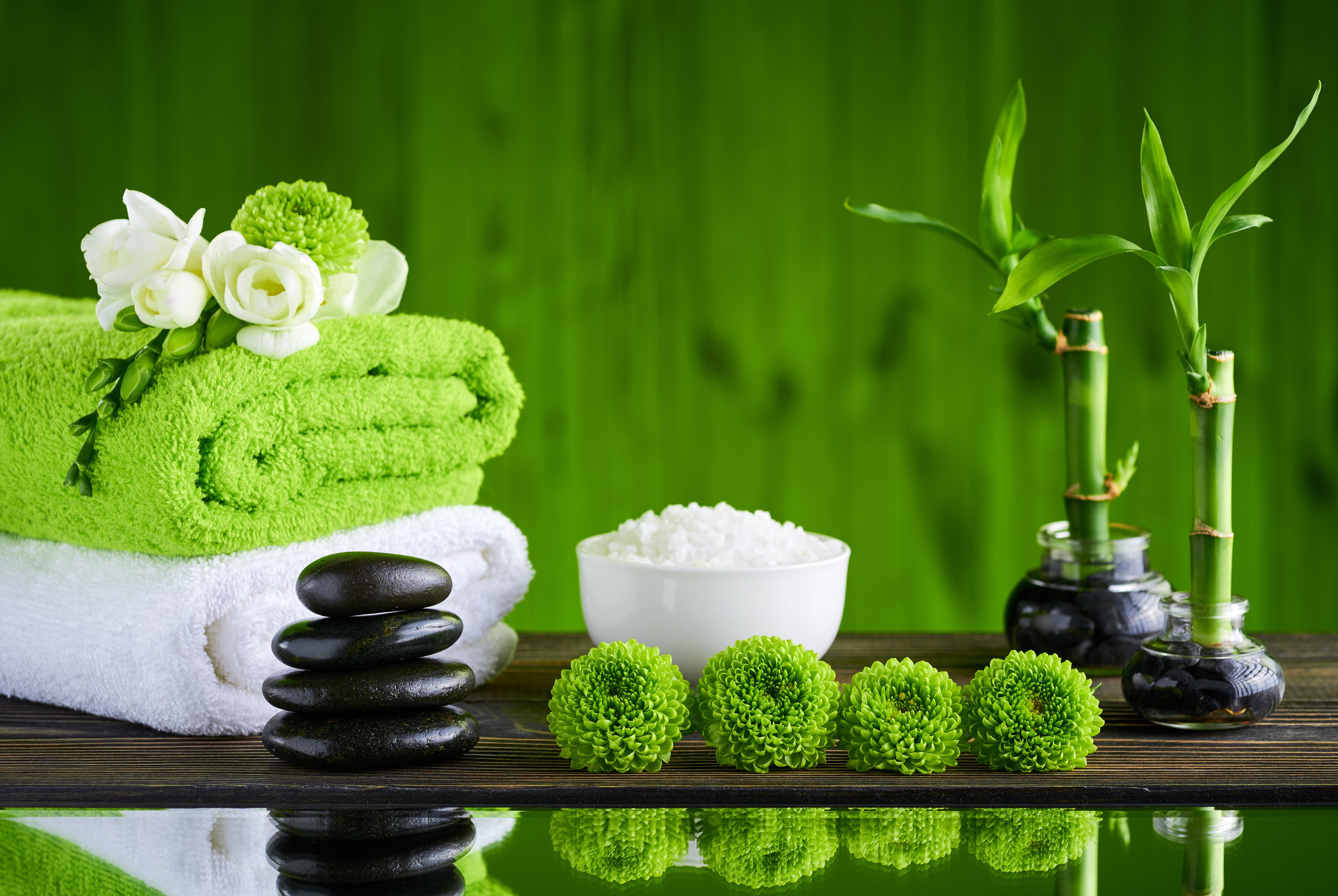 Spa towels, stones, salt, flowers, and bamboo HD Wallpaper