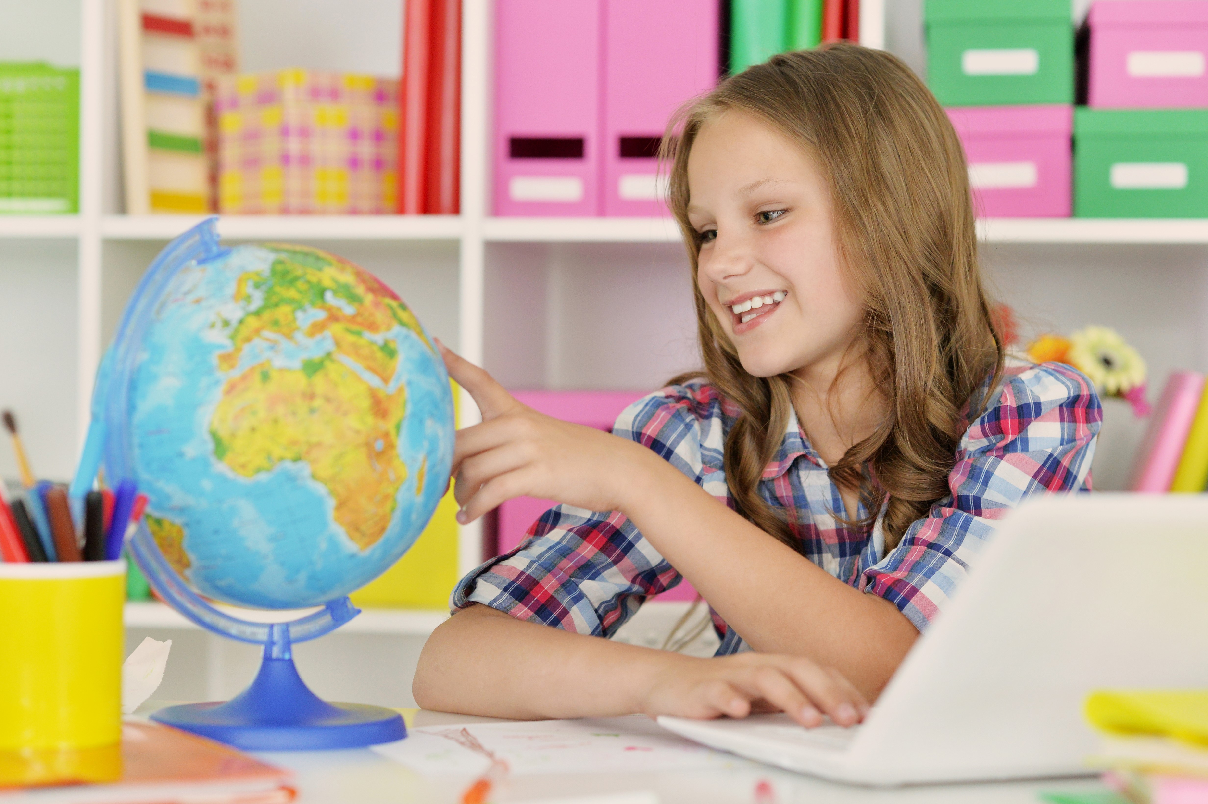 Girl with Globe and Laptop HD Wallpaper