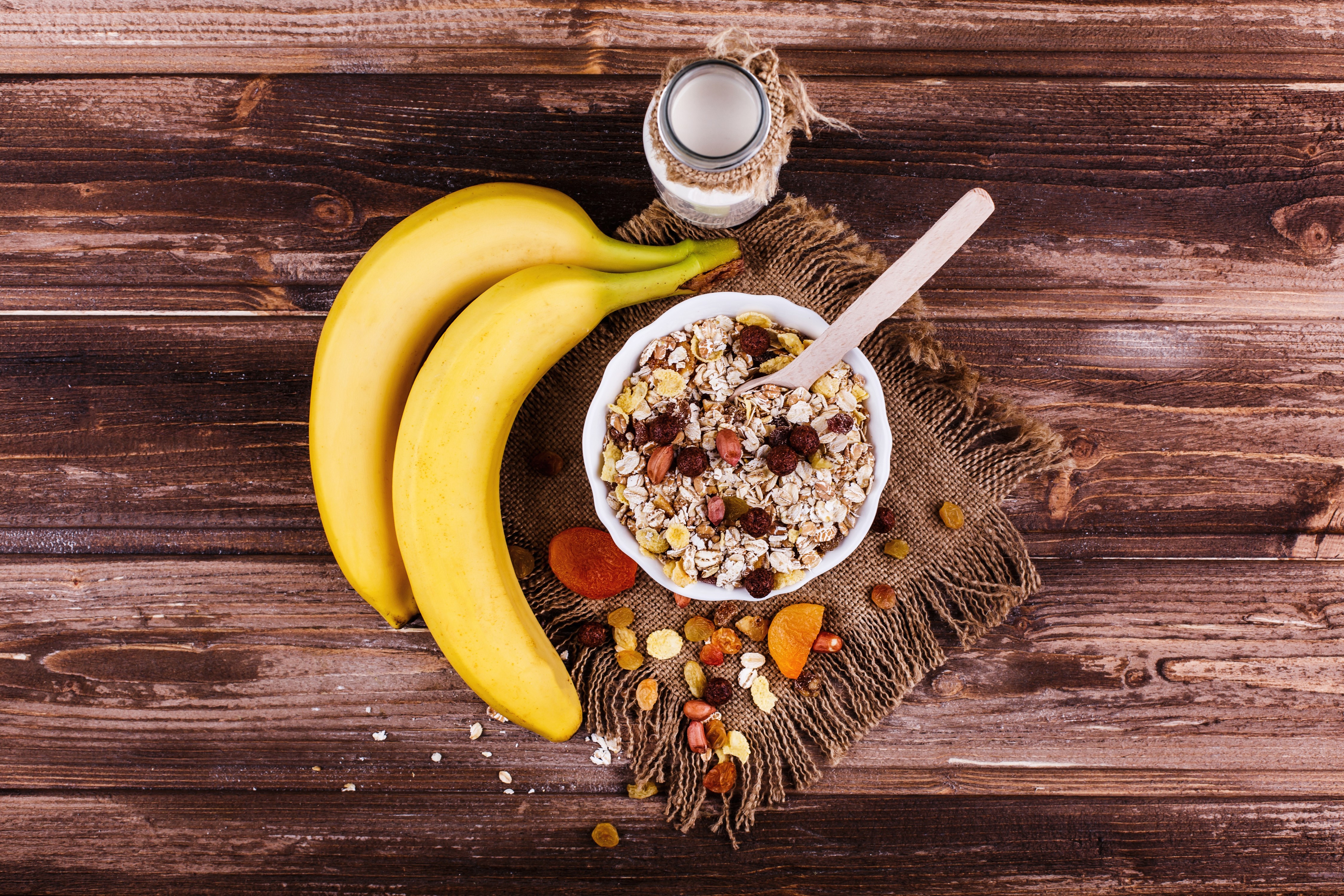 Bananas, Muesli, and Milk on Wood Planks HD Wallpaper