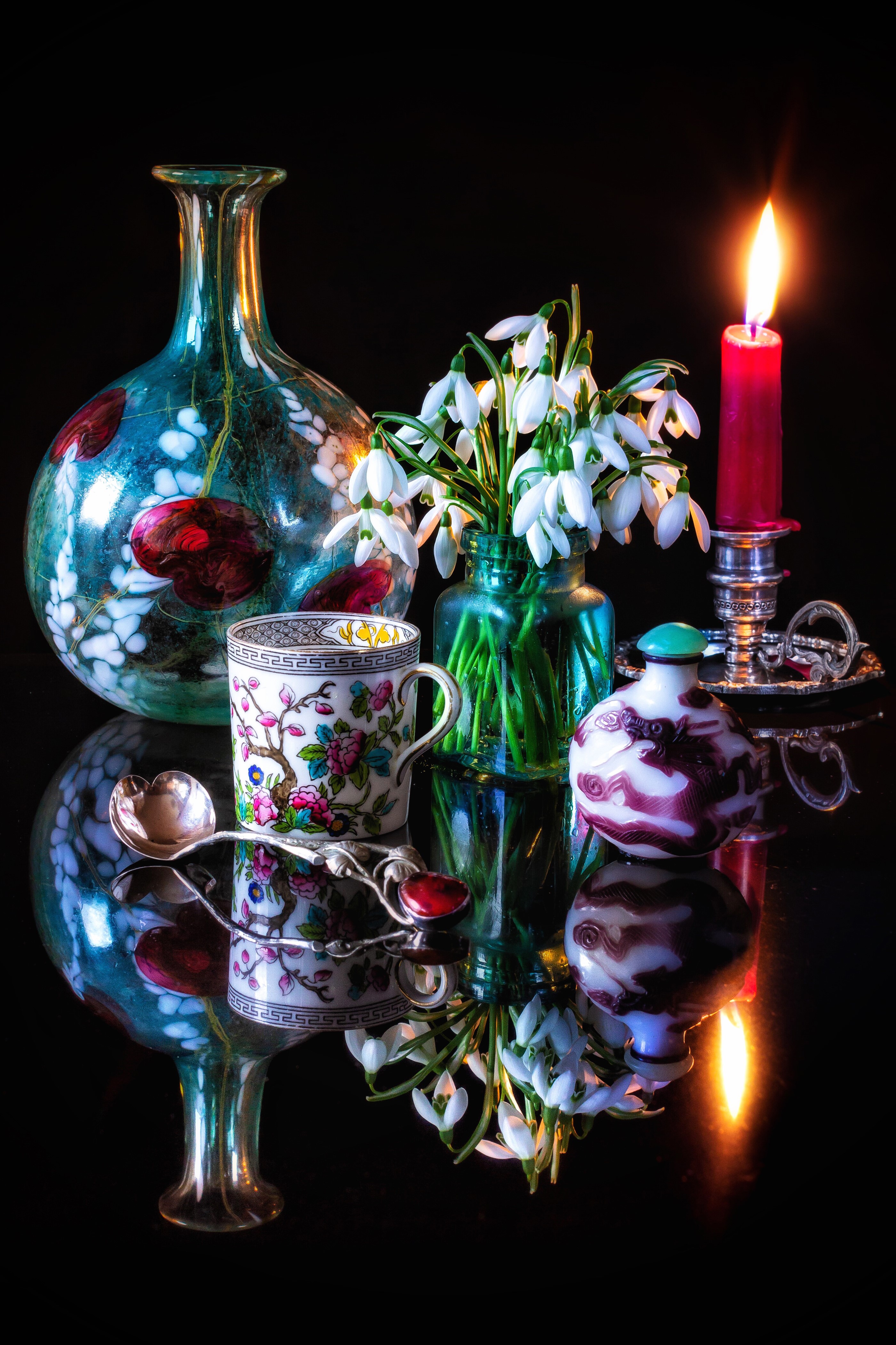 Still-life with snowdrops, cup, spoon, and candle HD Phone Wallpaper