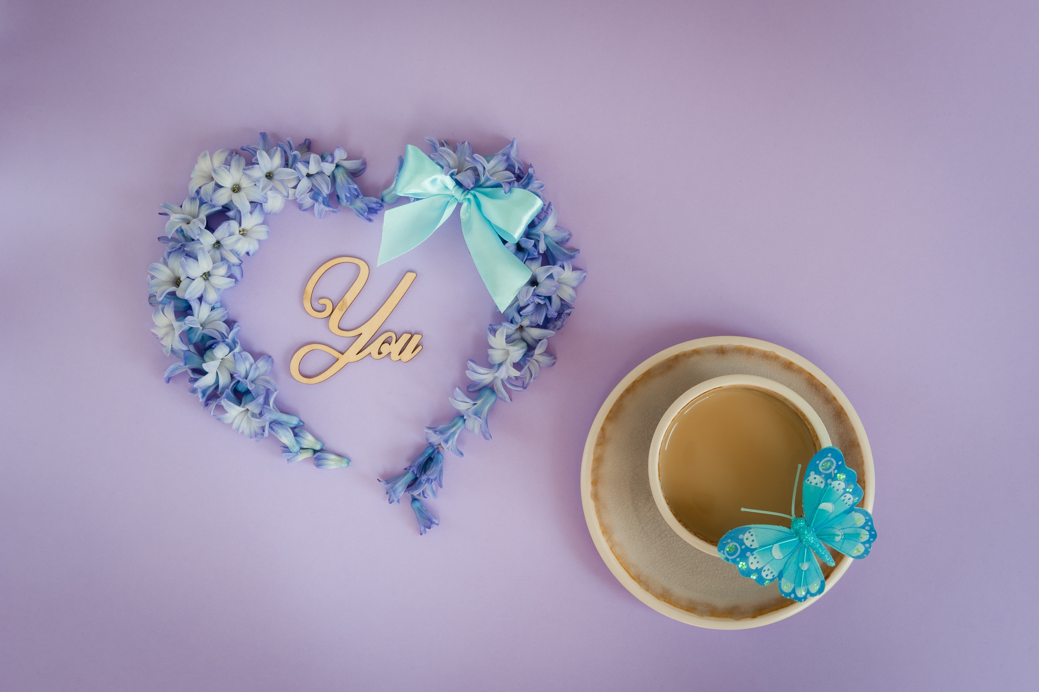 Heart made of flowers with coffee and butterfly HD Wallpaper