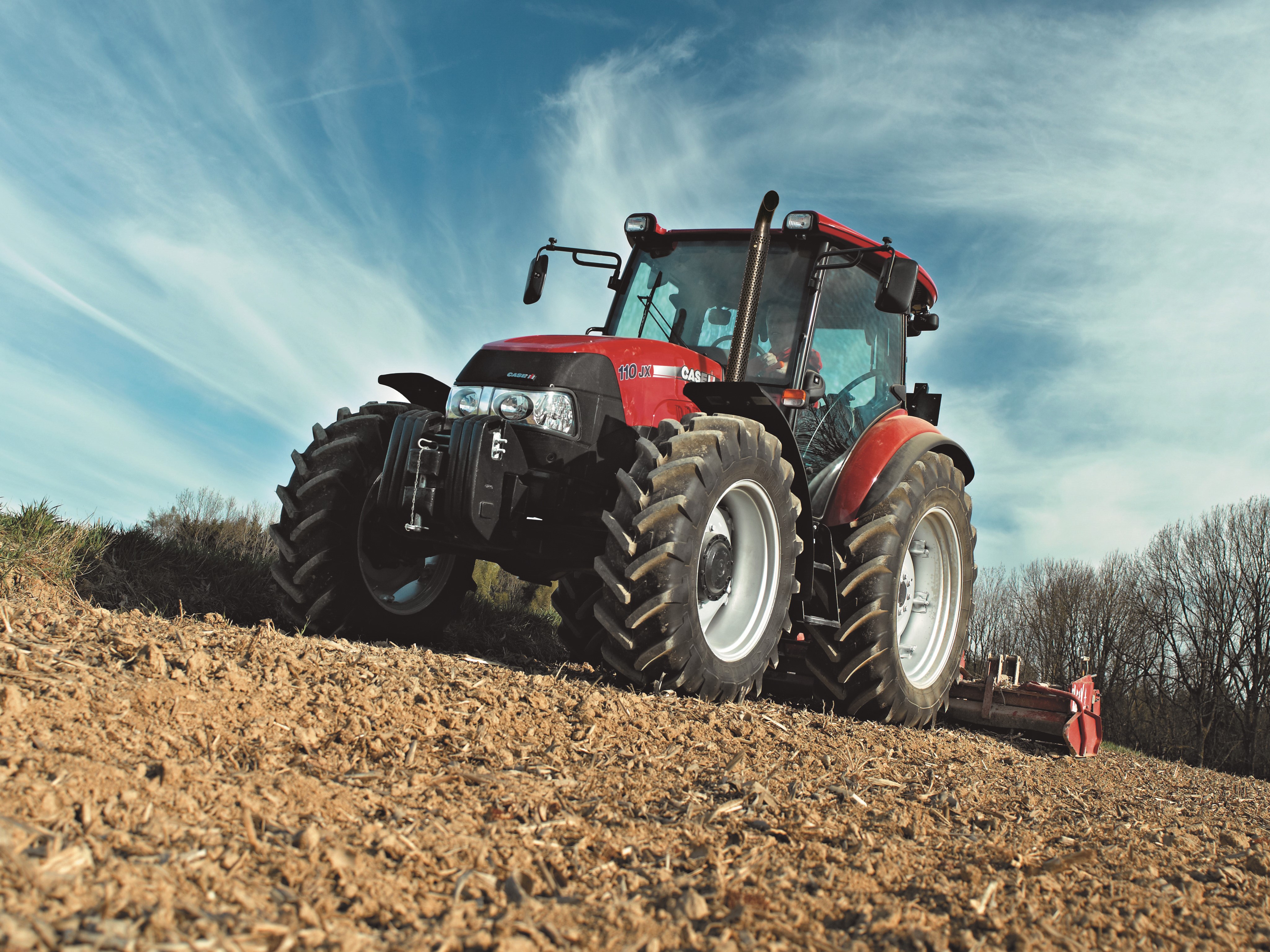 Case IH Farmall 110JX Tractor in Field HD Wallpaper