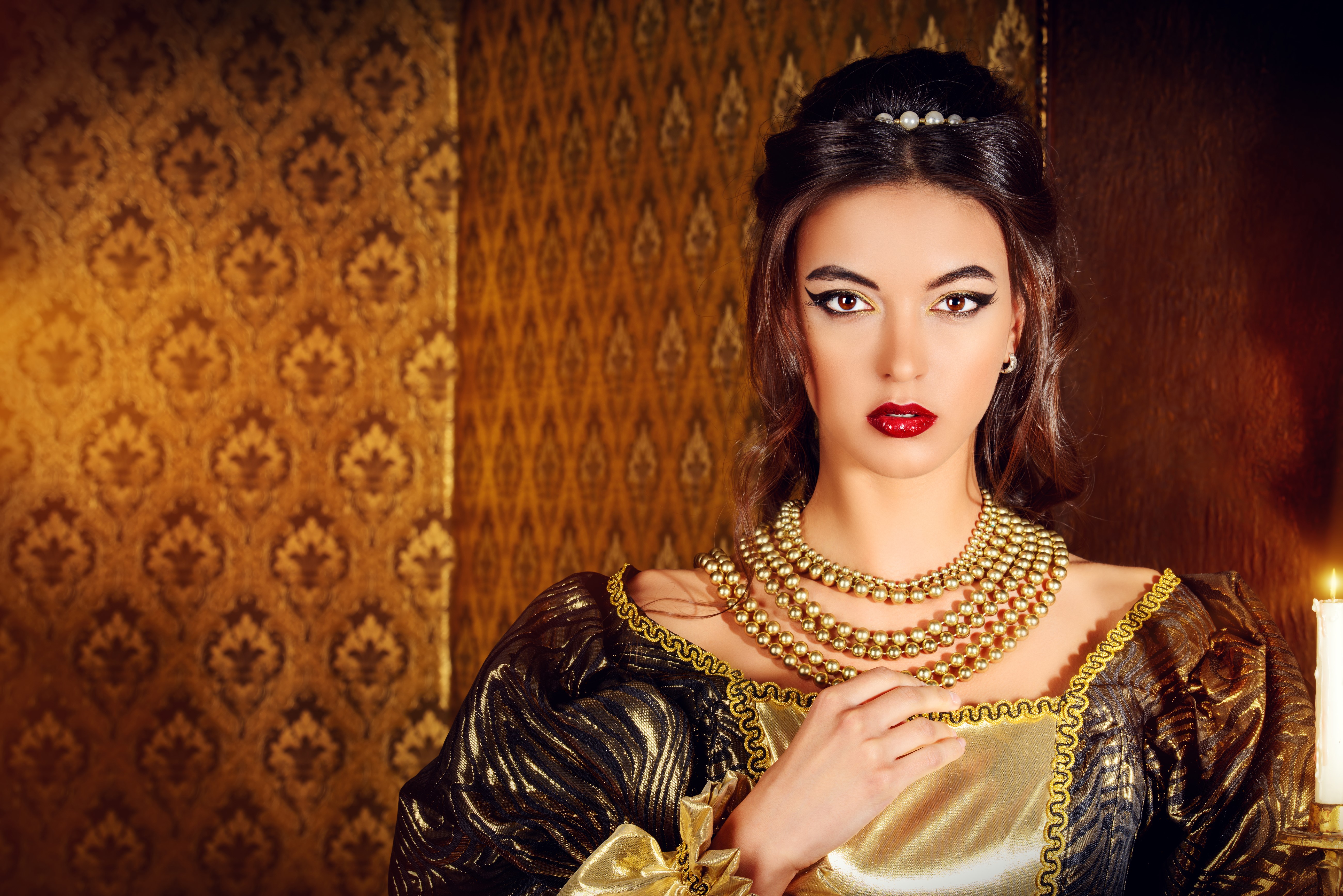 Woman in ornate dress with jewelry HD Wallpaper