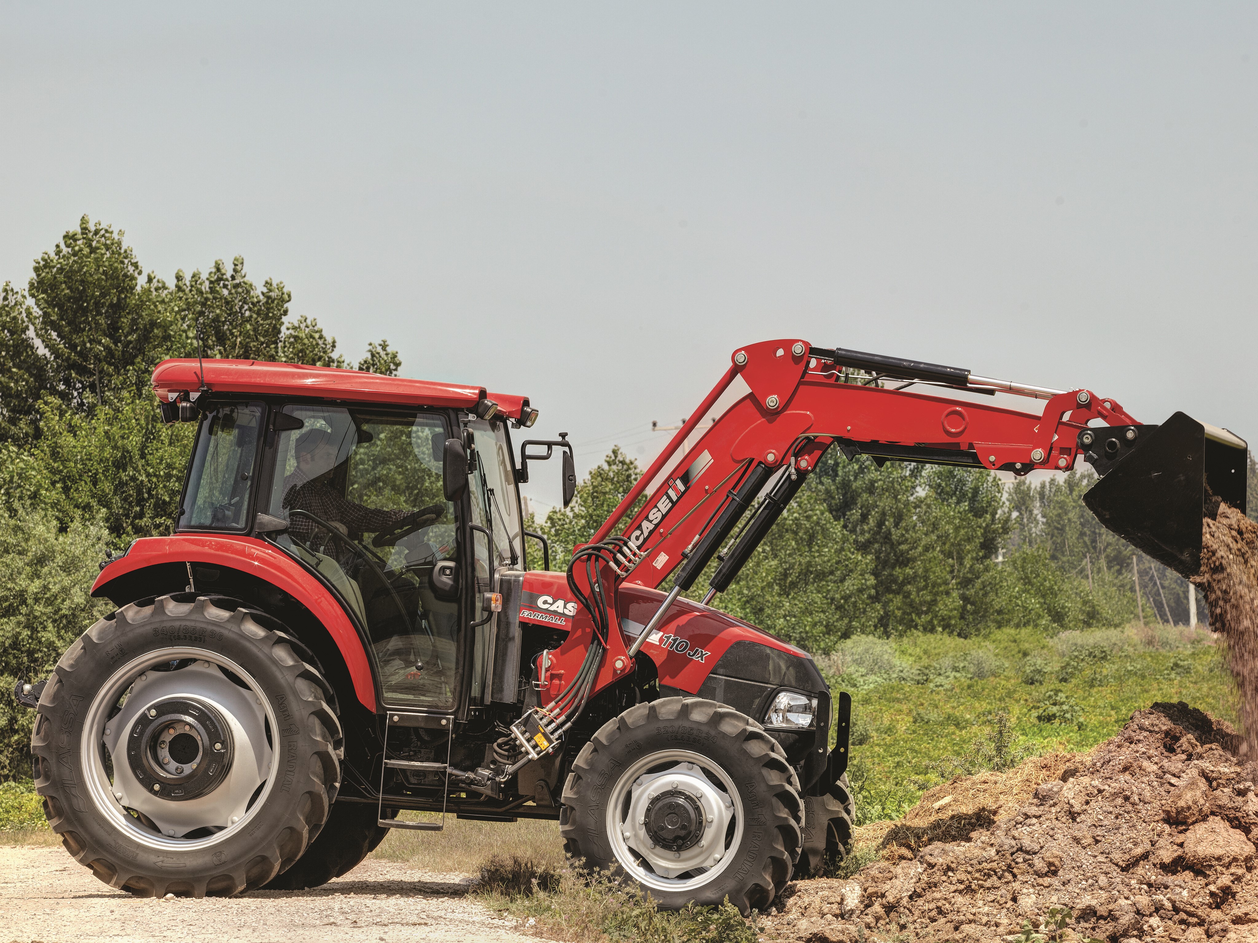 Case IH Farmall 110JX Tractor with Loader HD Wallpaper