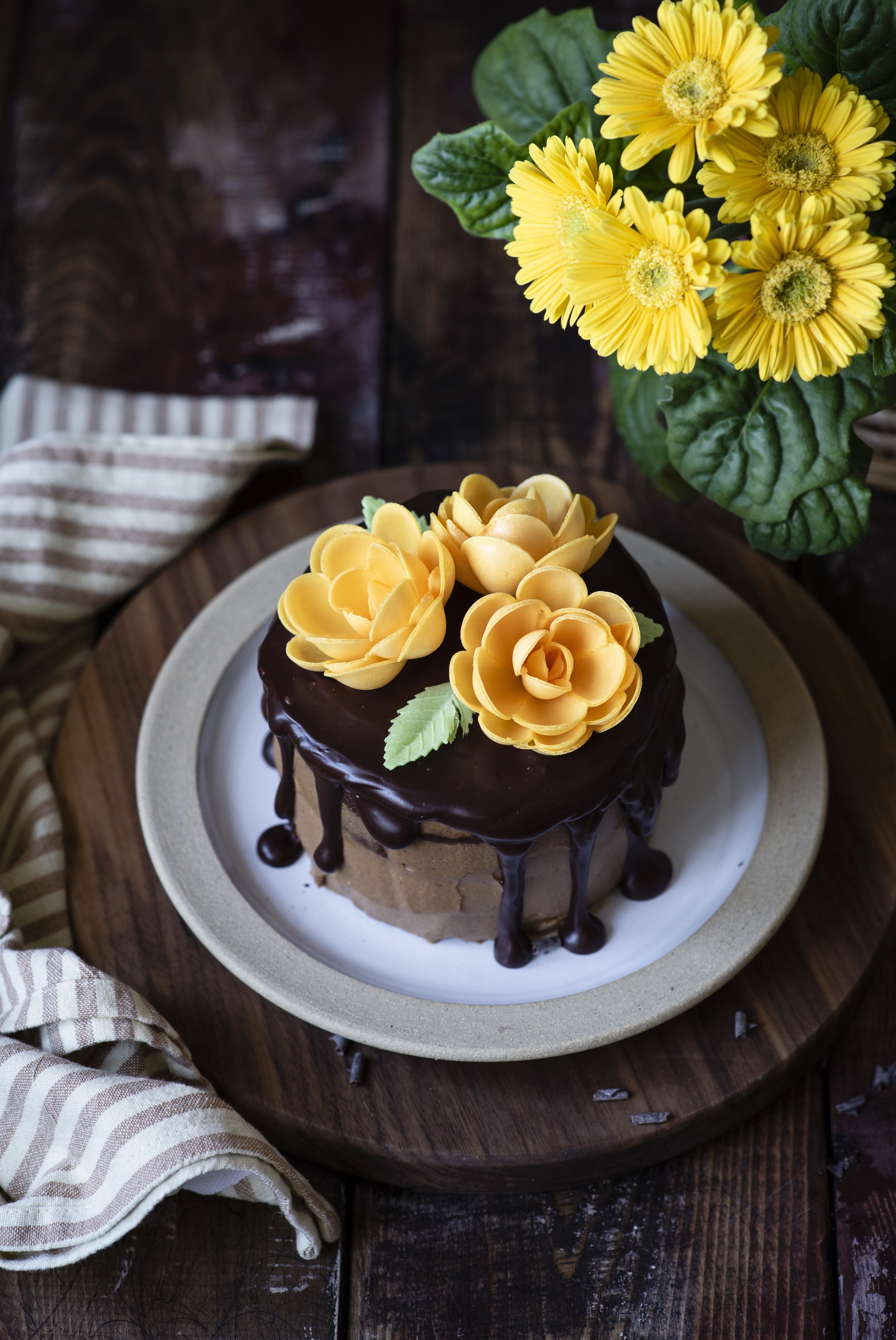 Chocolate cake with yellow flowers and chocolate ganache HD Phone Wallpaper