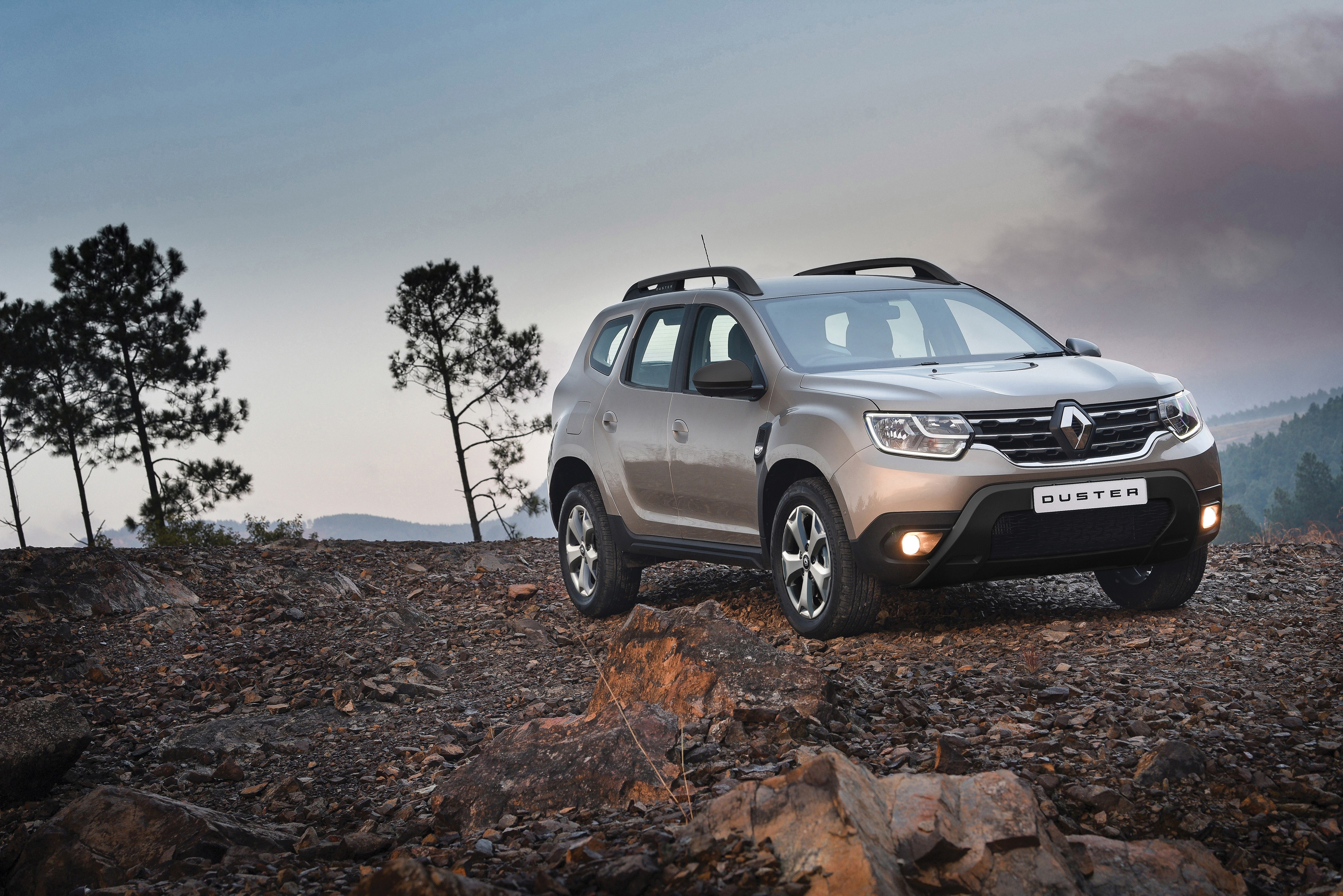 Renault Duster on rocky terrain HD Wallpaper