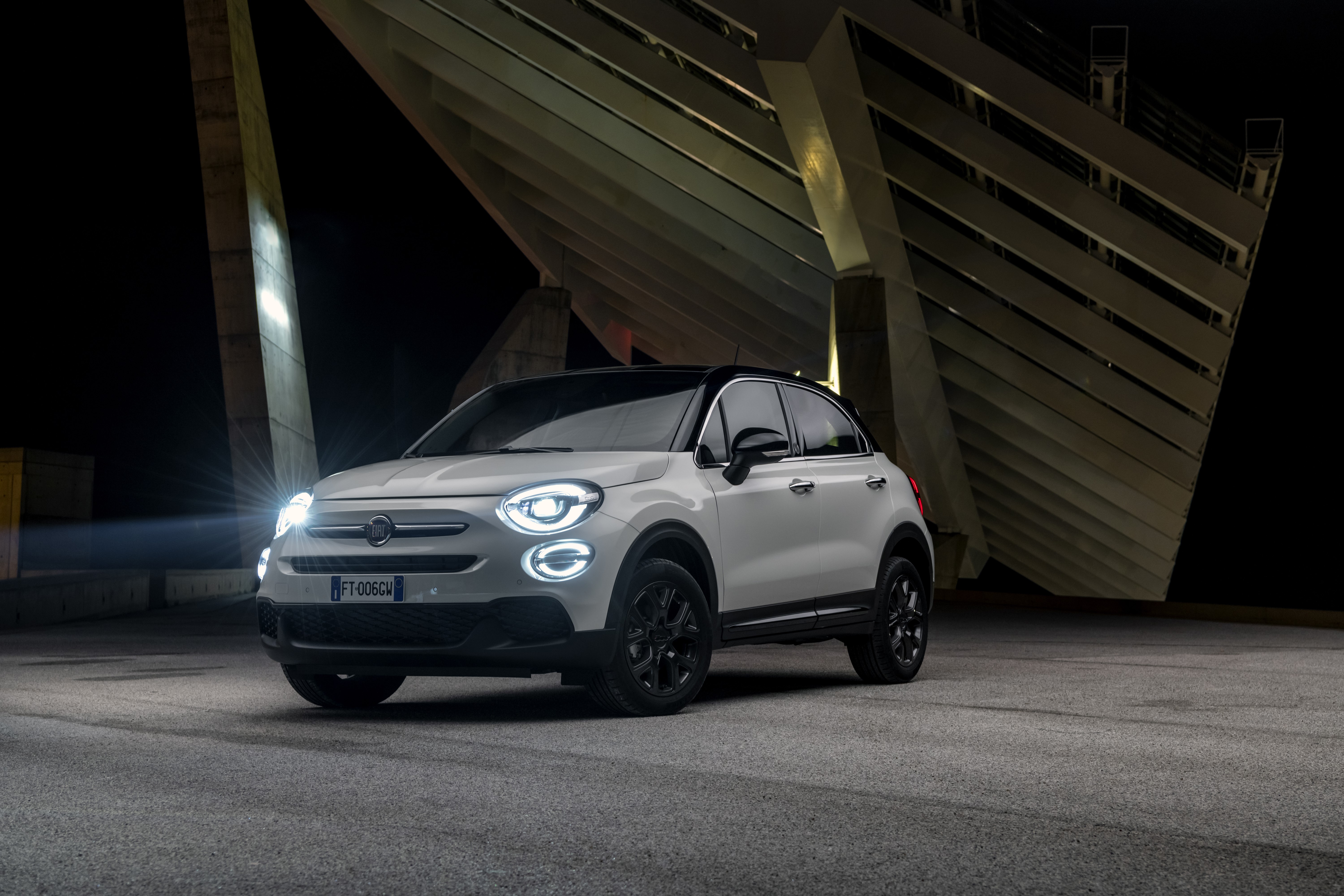 White Fiat 500X parked at night HD Wallpaper