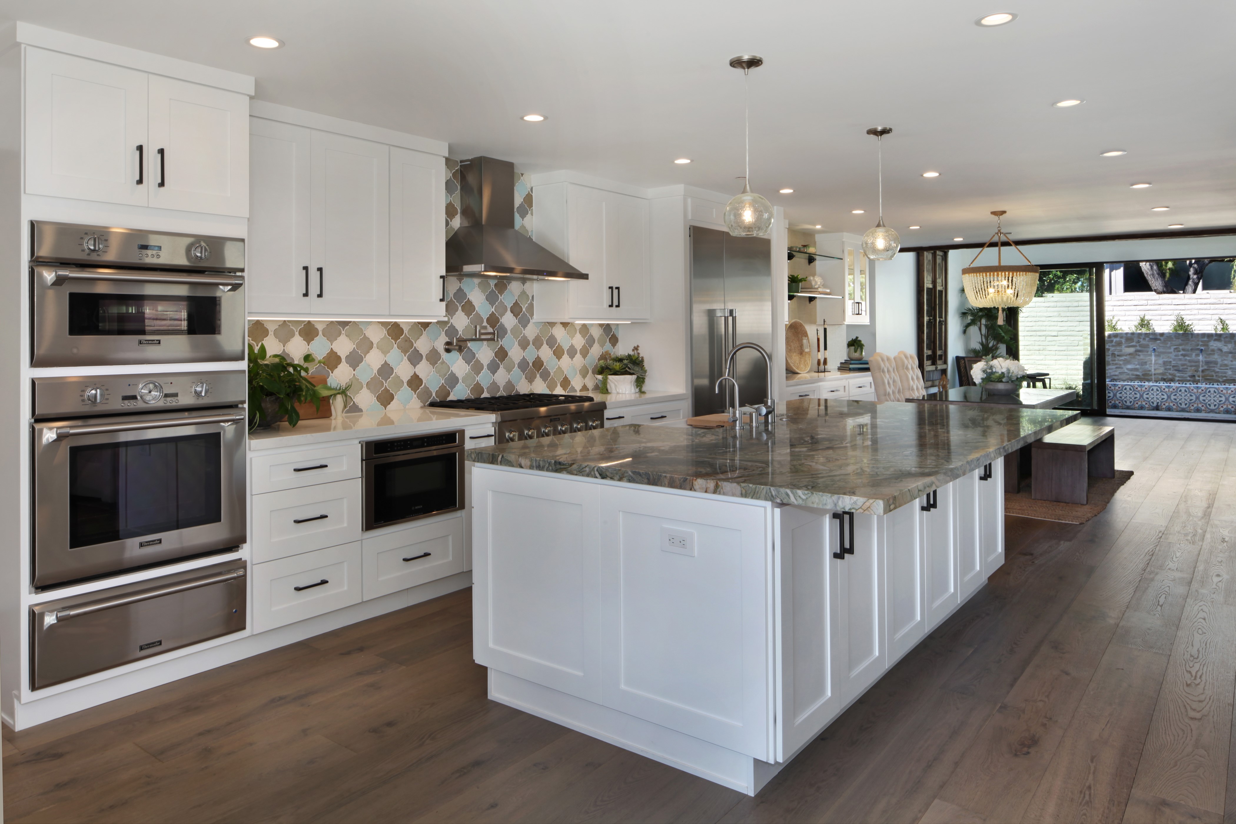 Modern Kitchen with Island and Dining Area HD Wallpaper
