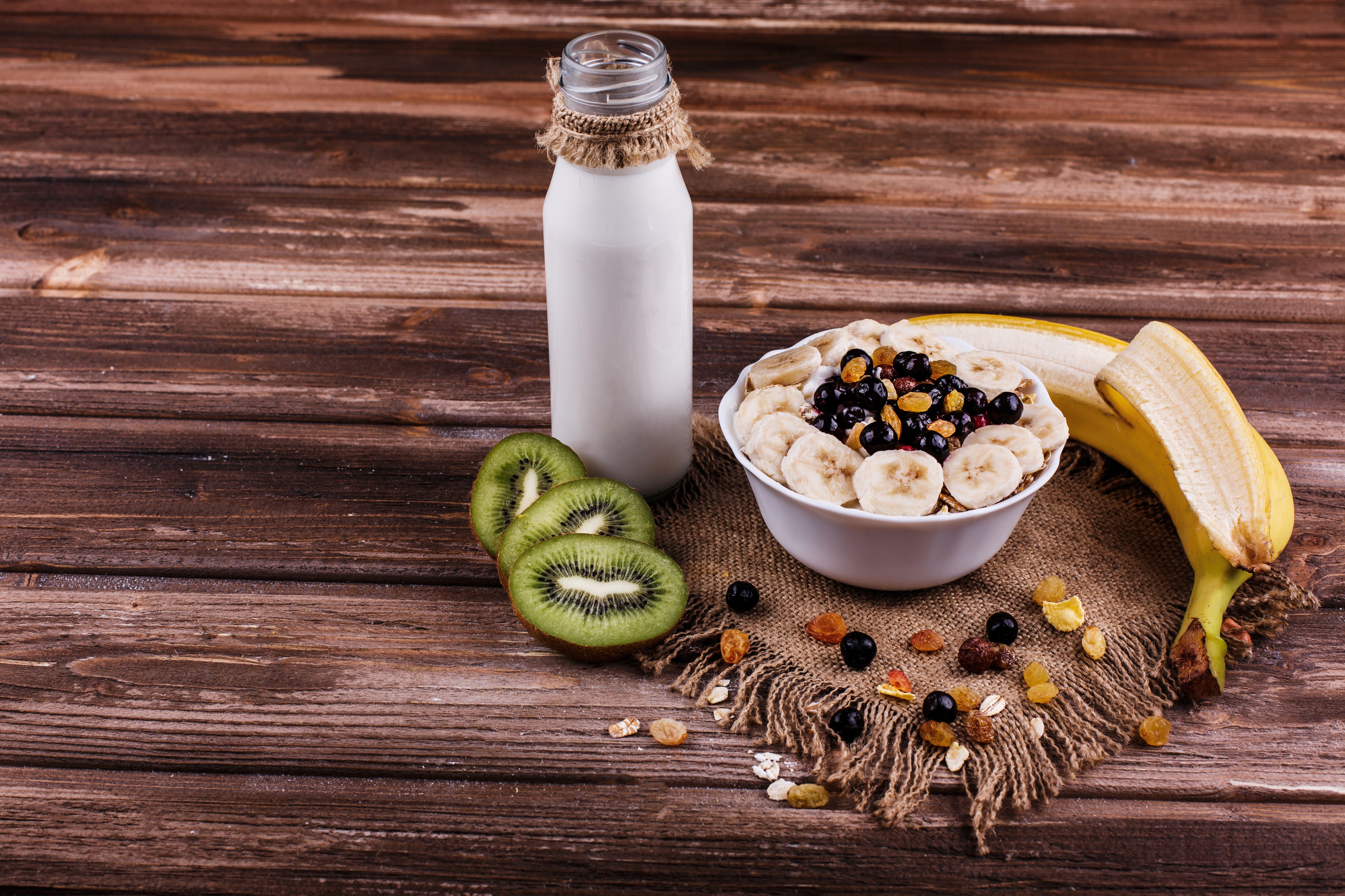 Bowl of Muesli with Bananas, Kiwi, and Milk HD Wallpaper