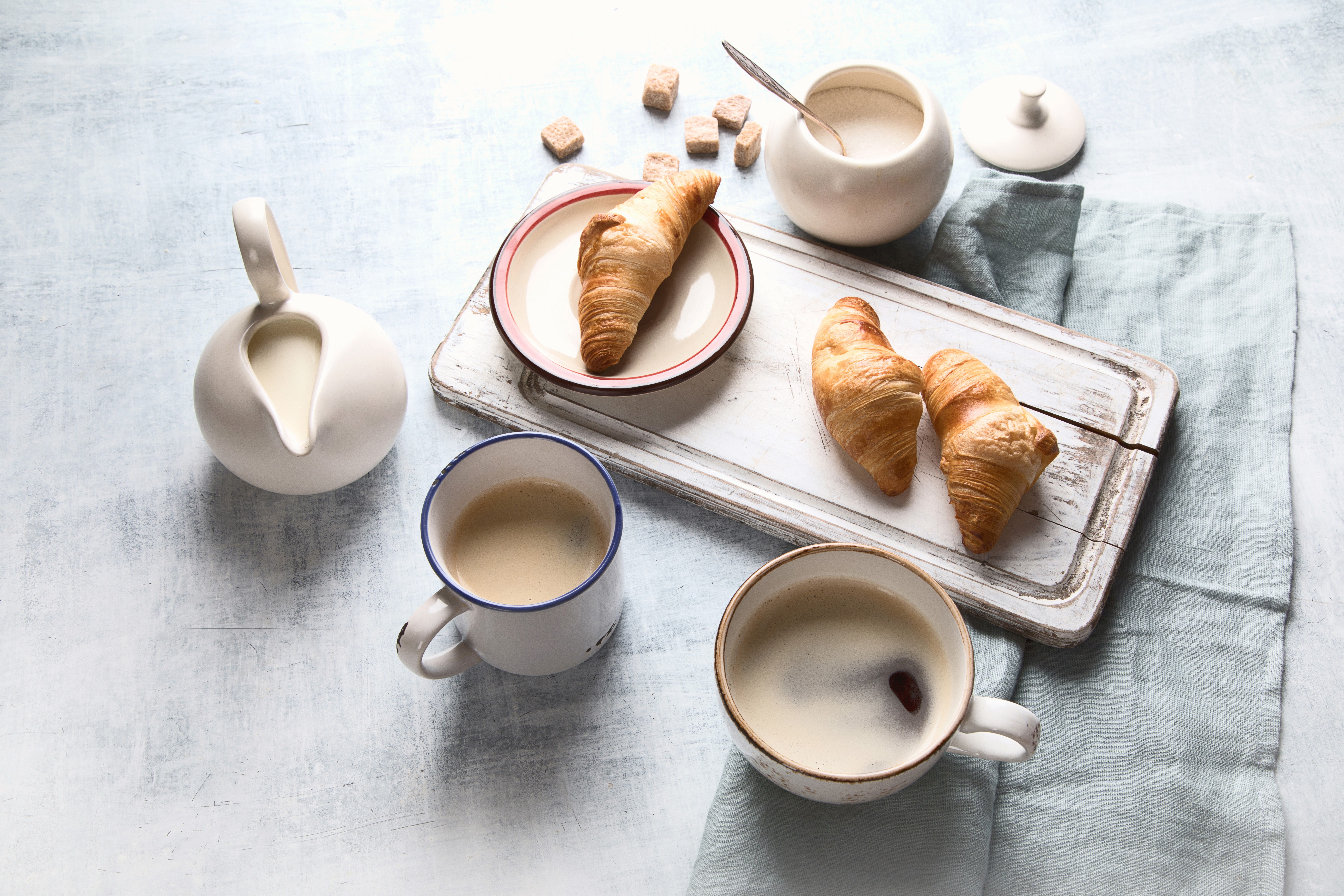 Croissants and coffee with cream and sugar HD Wallpaper