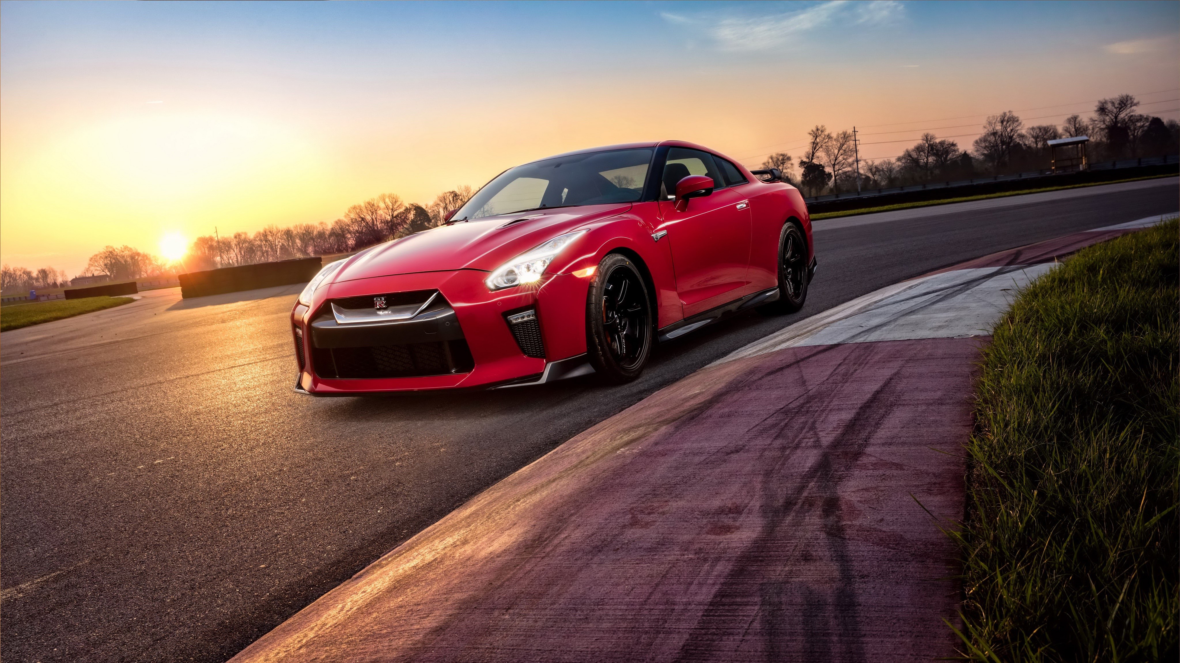 Red 2017 Nissan GTR Track Edition on a Racetrack HD Wallpaper