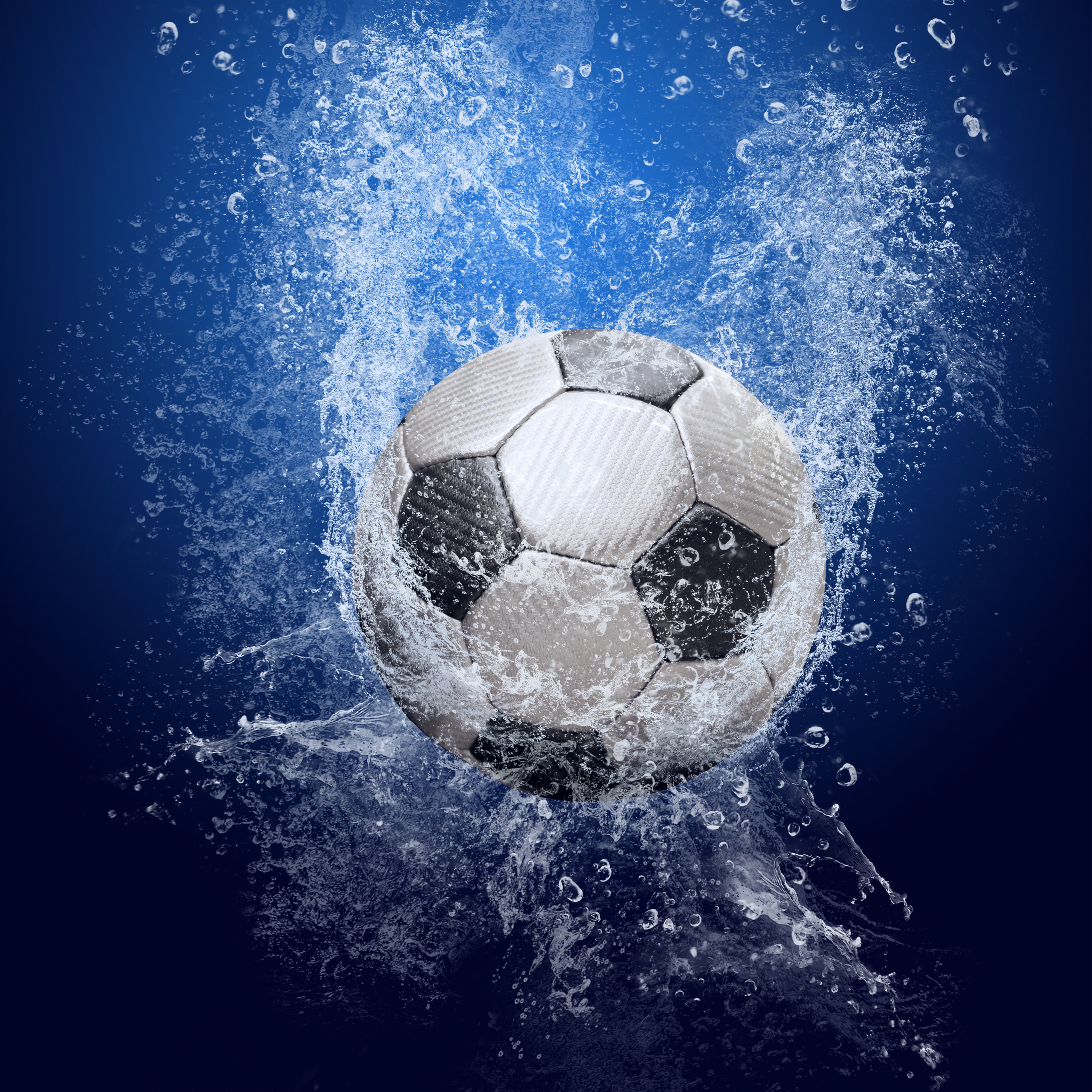Soccer ball in a water splash HD Wallpaper