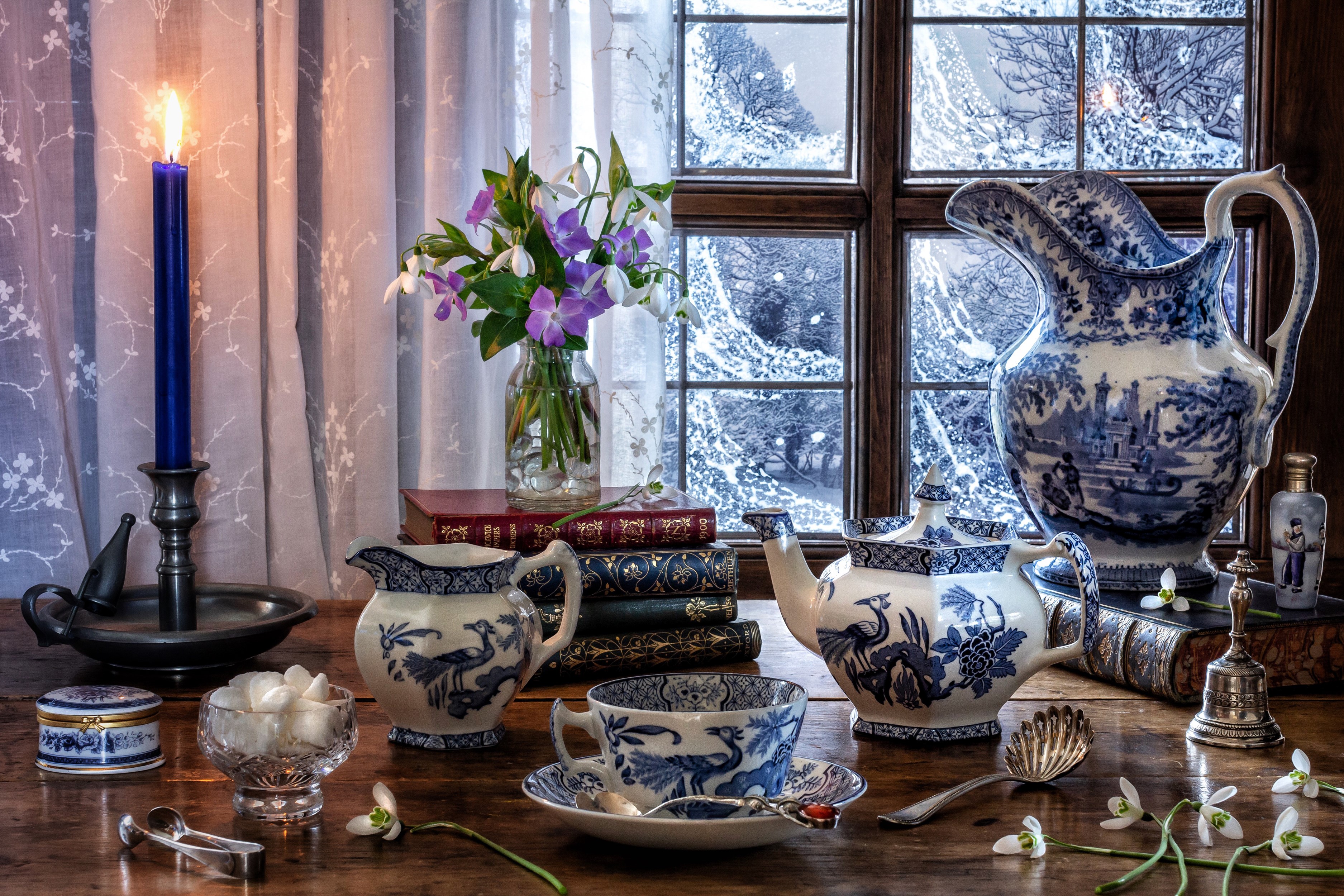 Winter tea set still life with candle and snowdrops HD Wallpaper