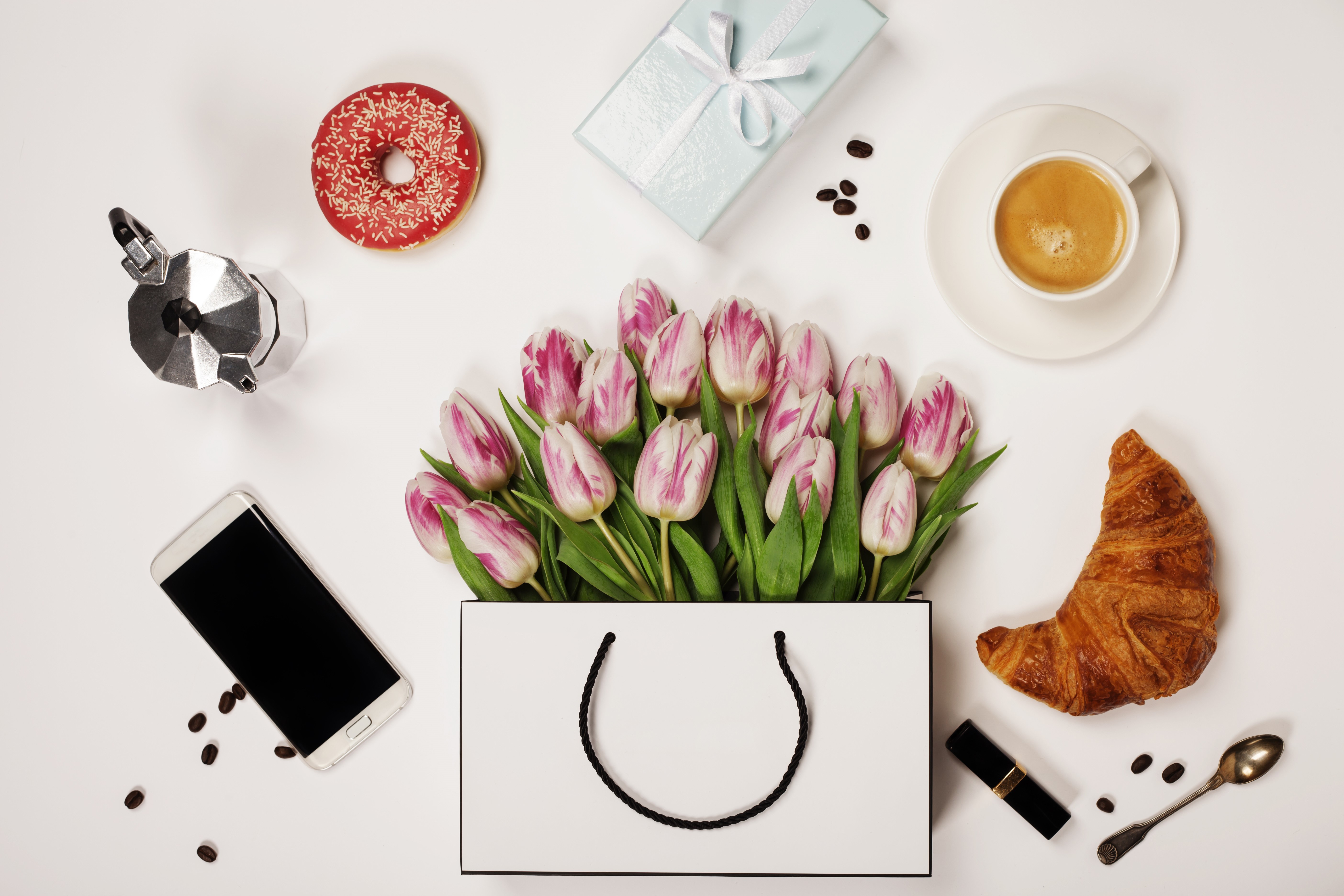 Tulips in a handbag with coffee, croissant, donut, gift, phone, and moka pot HD Wallpaper