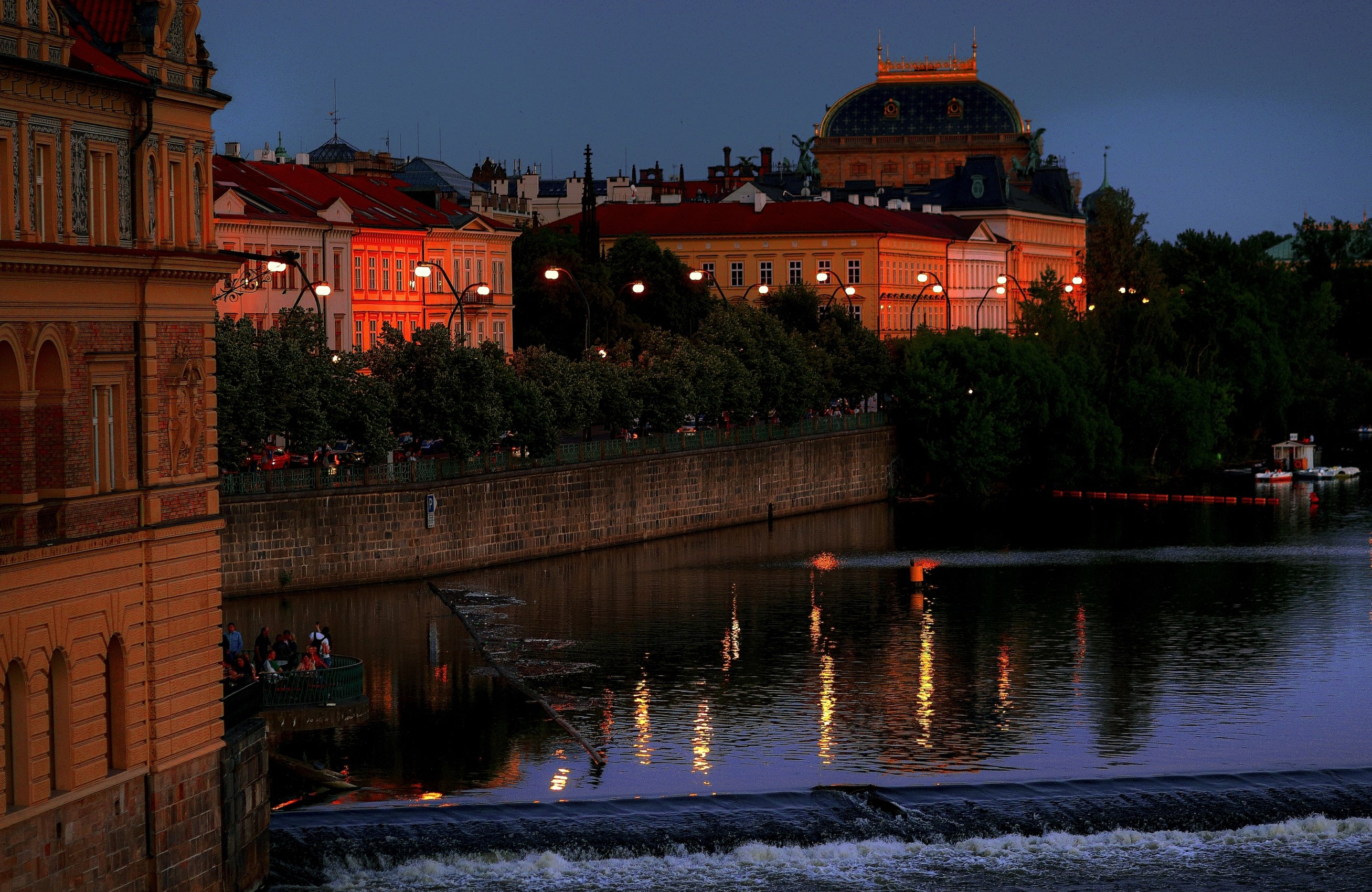 Prague buildings and river at dusk HD Wallpaper