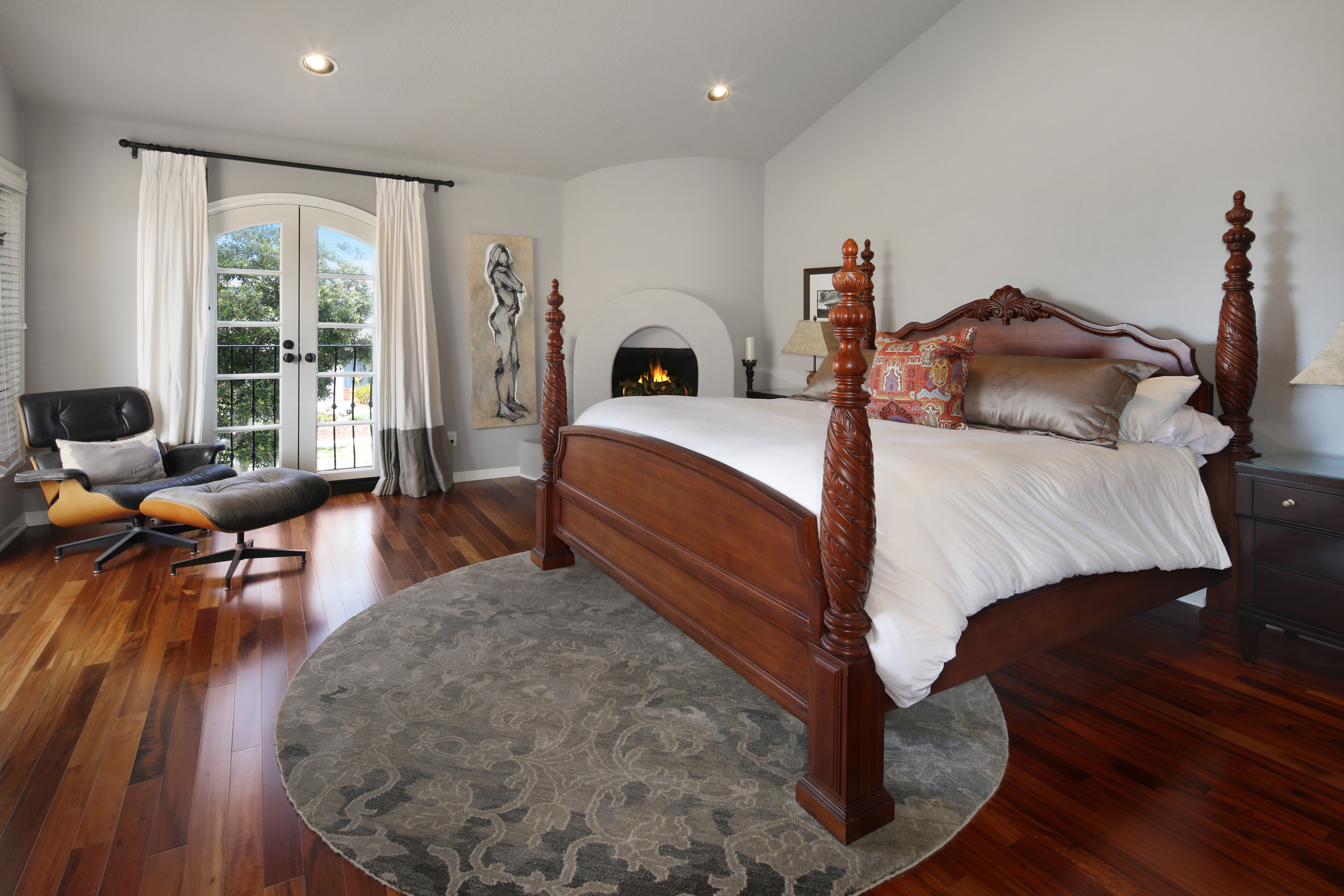 Bedroom with Four-Poster Bed and Armchair HD Wallpaper