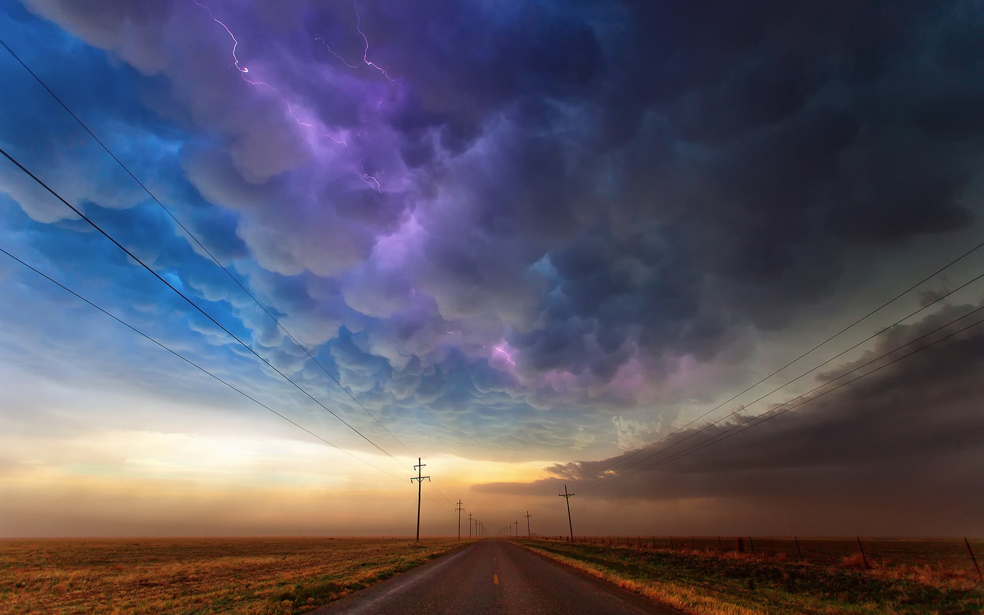 Stormy Sky with Lightning Over a Rural Road HD Wallpaper