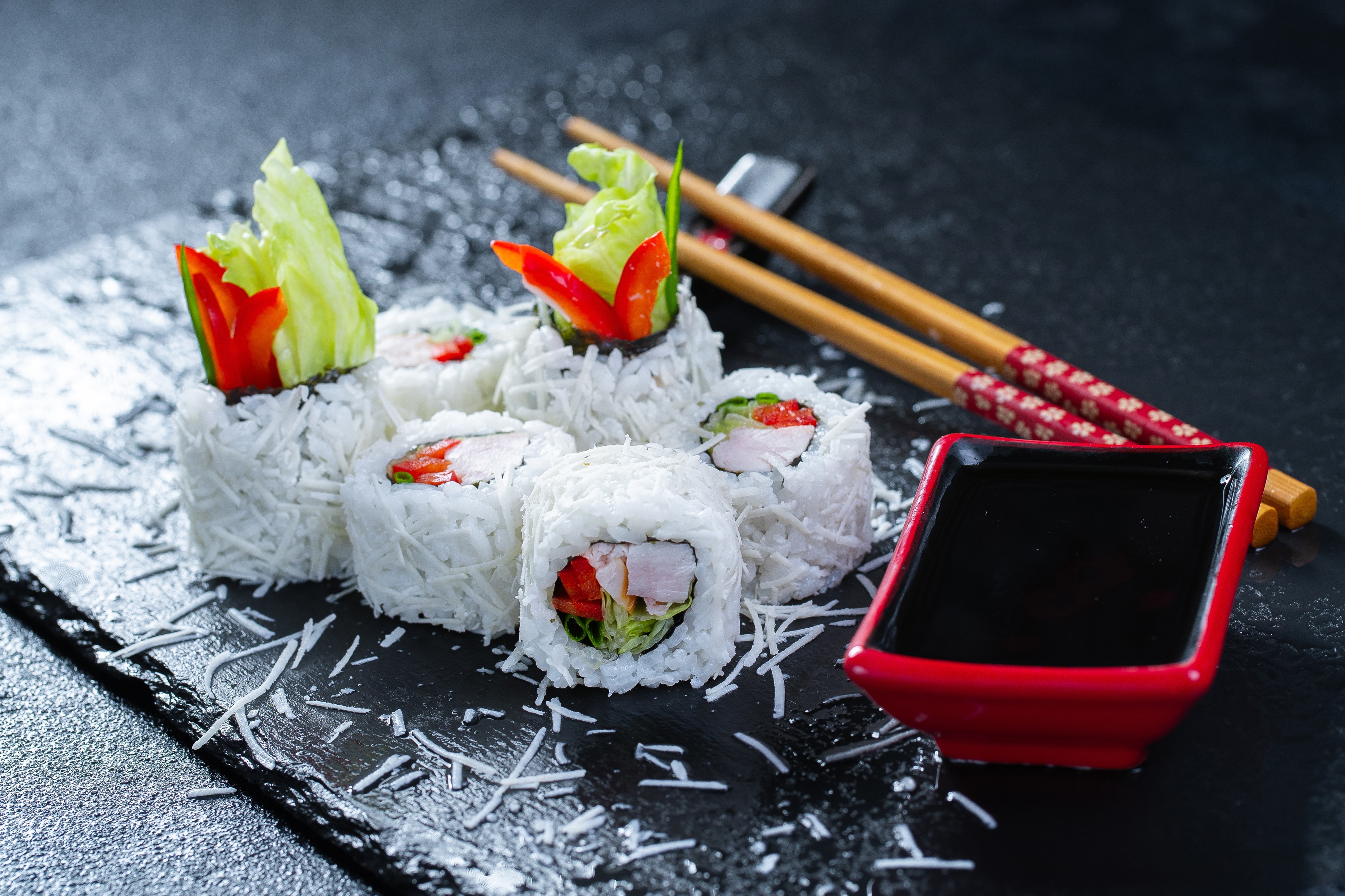 Sushi rolls with chopsticks and soy sauce HD Wallpaper