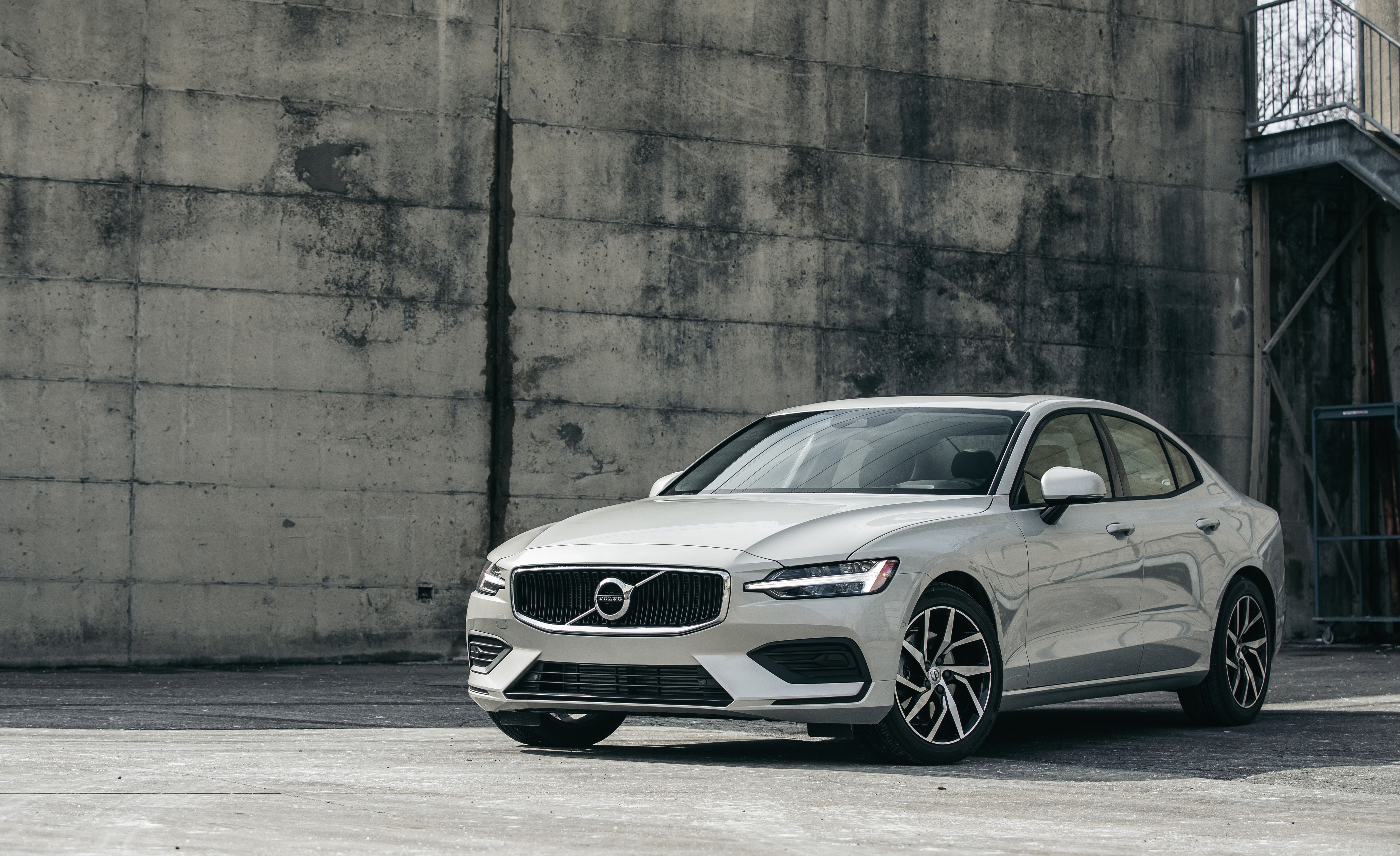 White Volvo S60 T5 Momentum parked near concrete wall HD Wallpaper