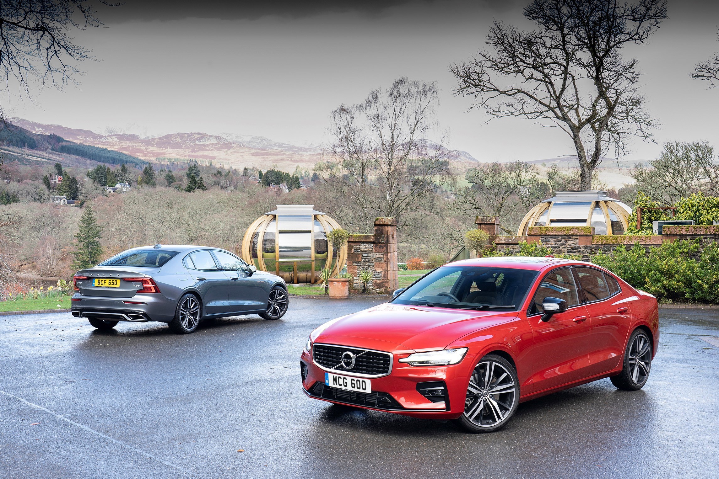 Two Volvo S60 T5 R-Design cars in a landscape HD Wallpaper