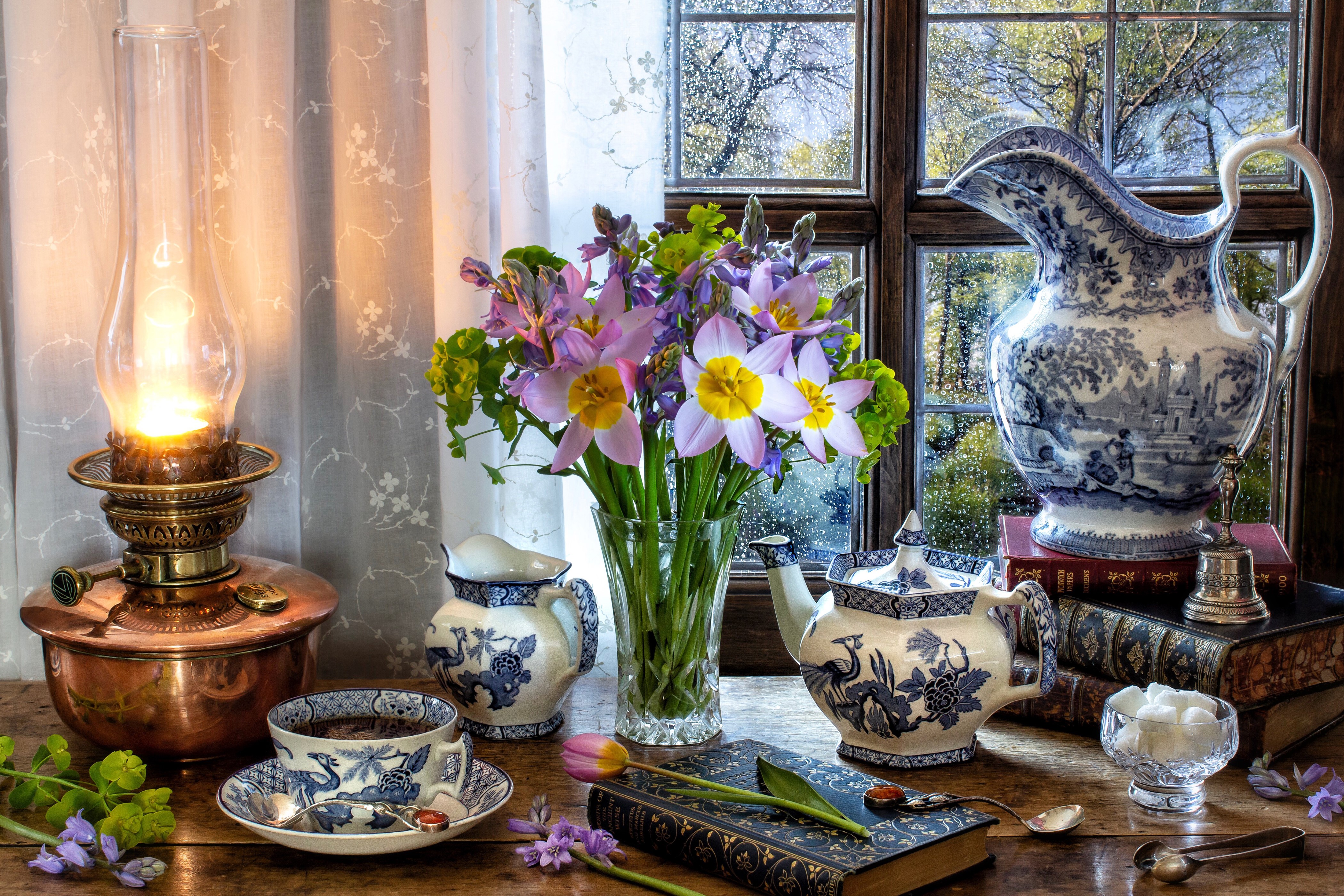 Still-life with kerosene lamp, tea set, and flowers HD Wallpaper