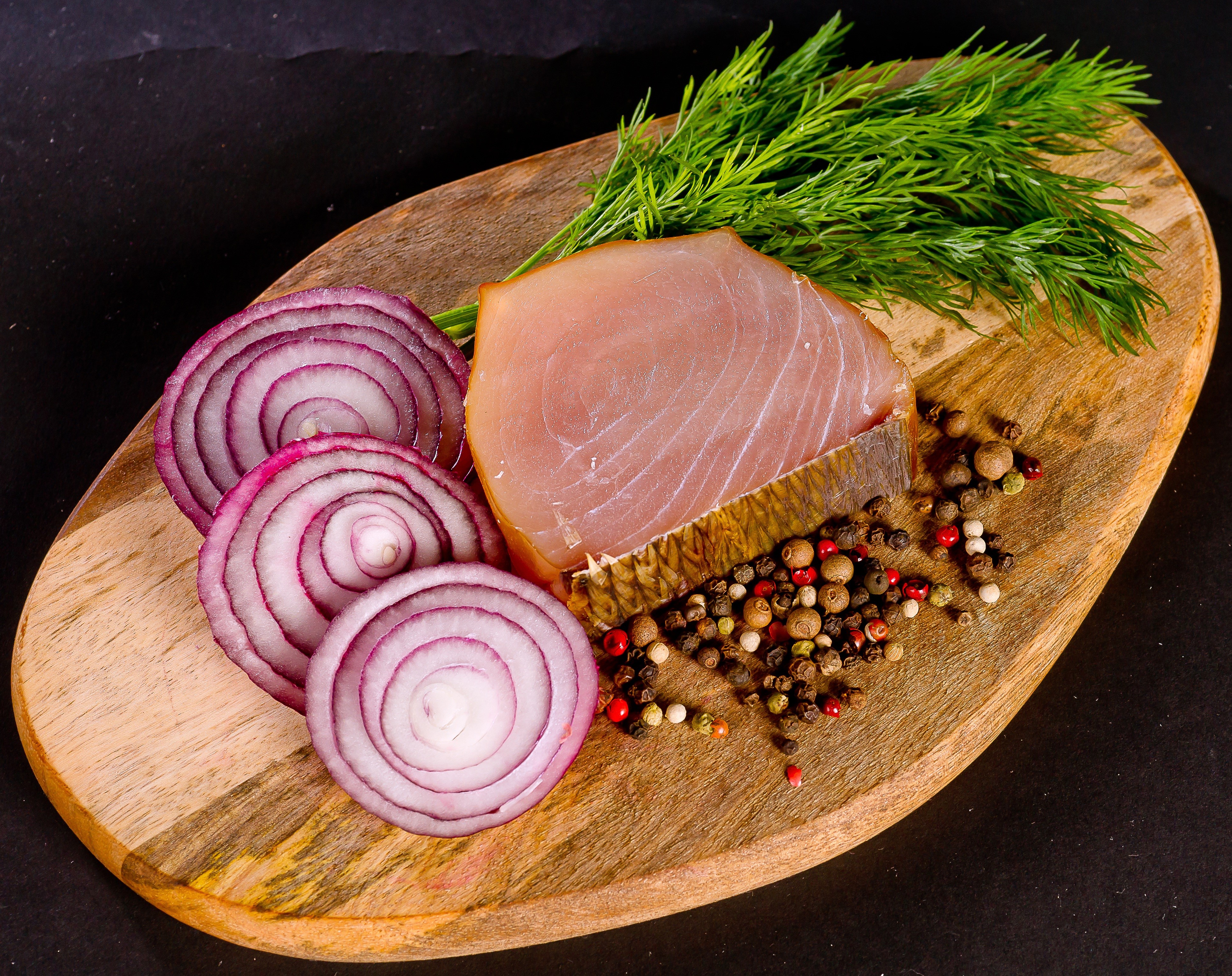 Smoked Fish with Red Onion, Dill, and Spices on Cutting Board HD Wallpaper