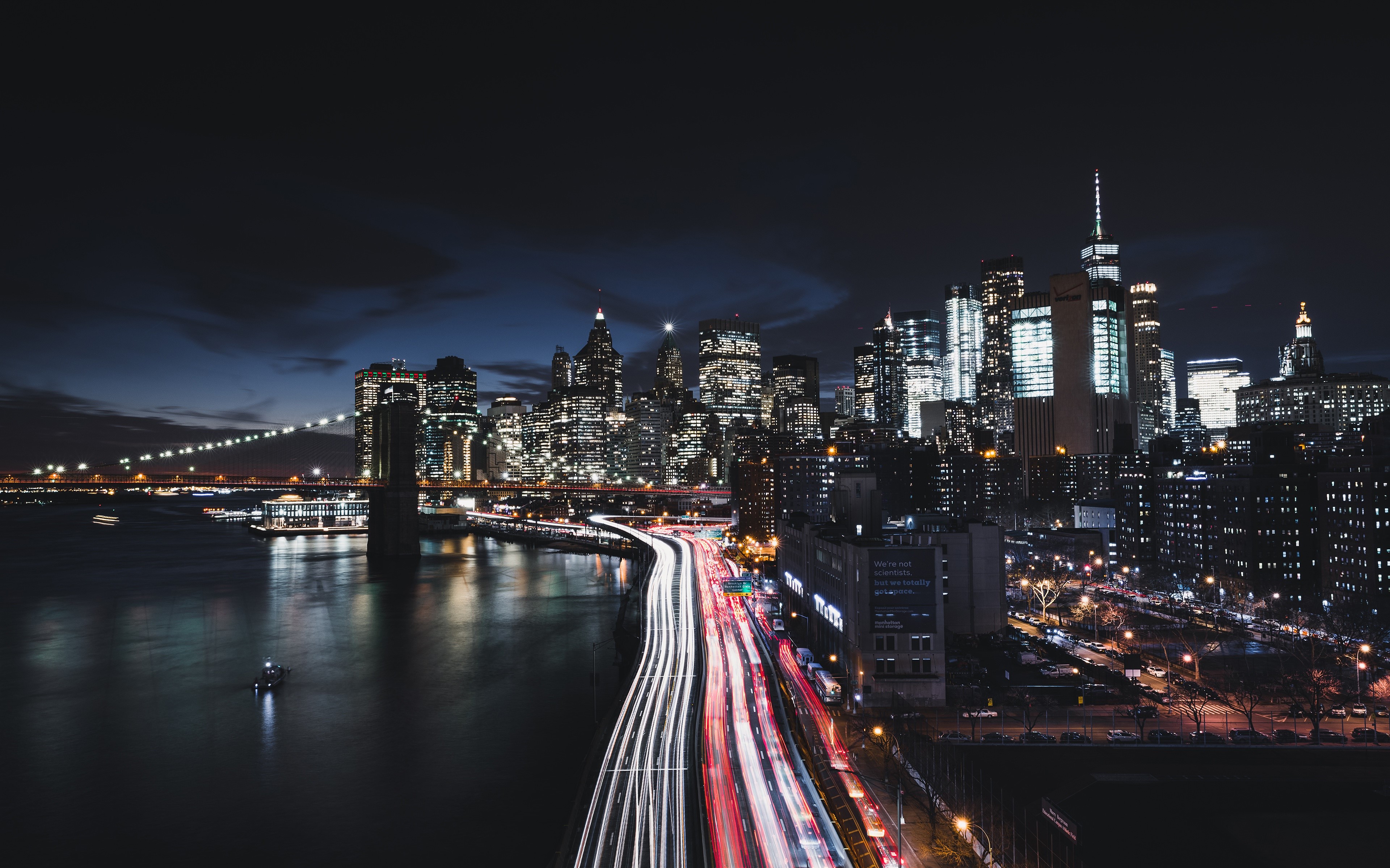 New York City Skyline at Night with Brooklyn Bridge HD Wallpaper