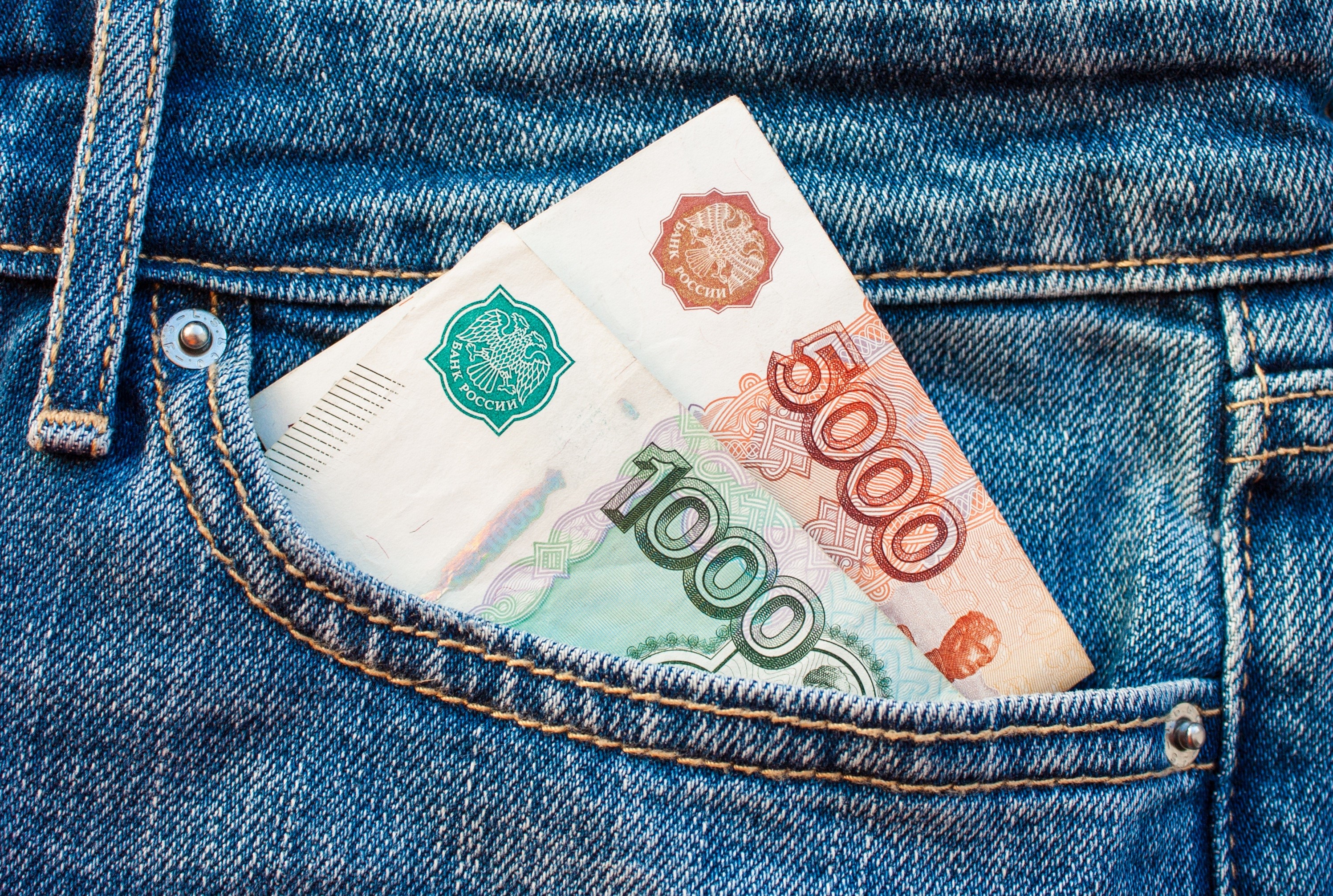 Russian Ruble banknotes in a jeans pocket HD Wallpaper