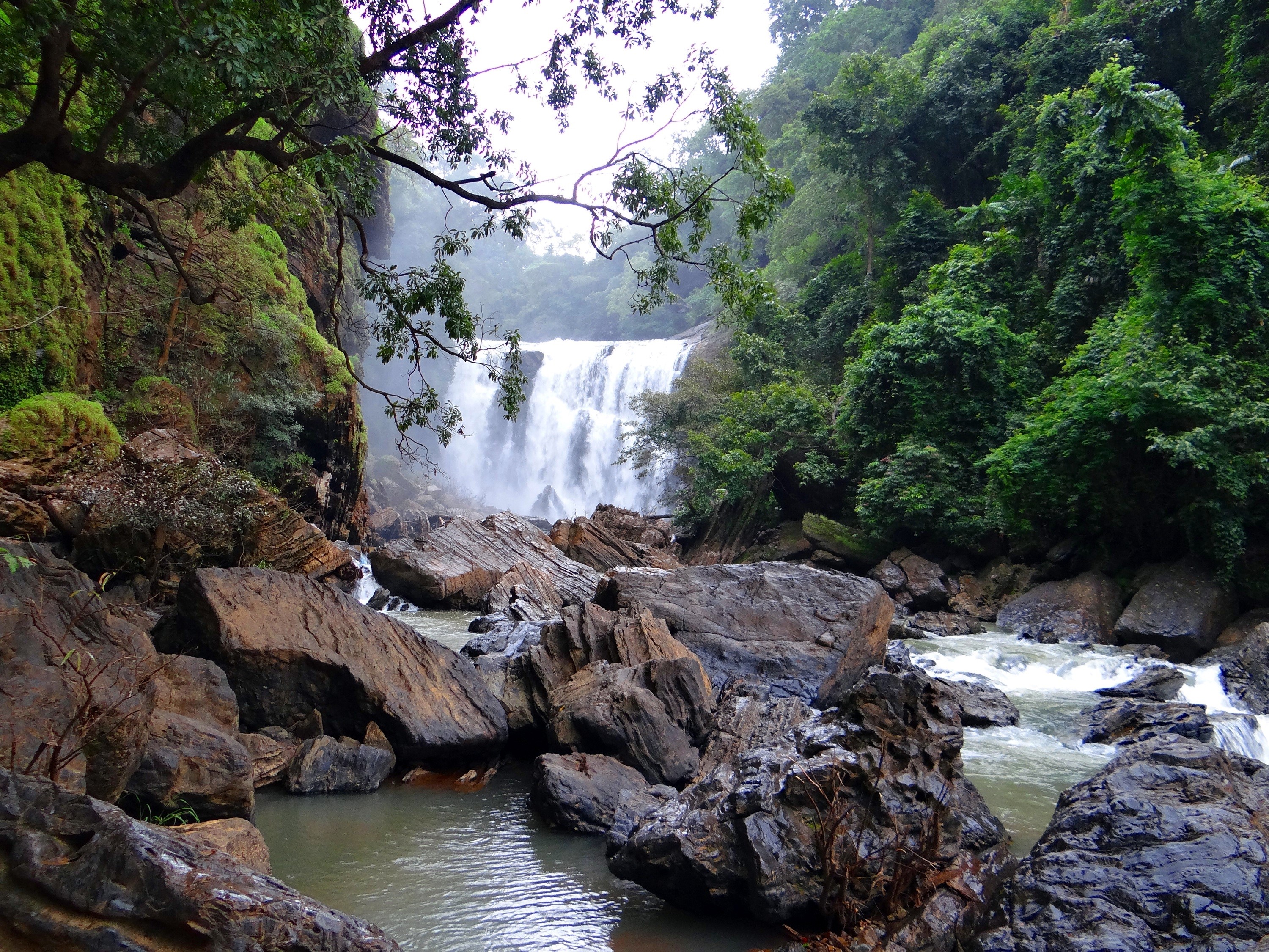 Sathodi Waterfall with rocks and trees HD Wallpaper
