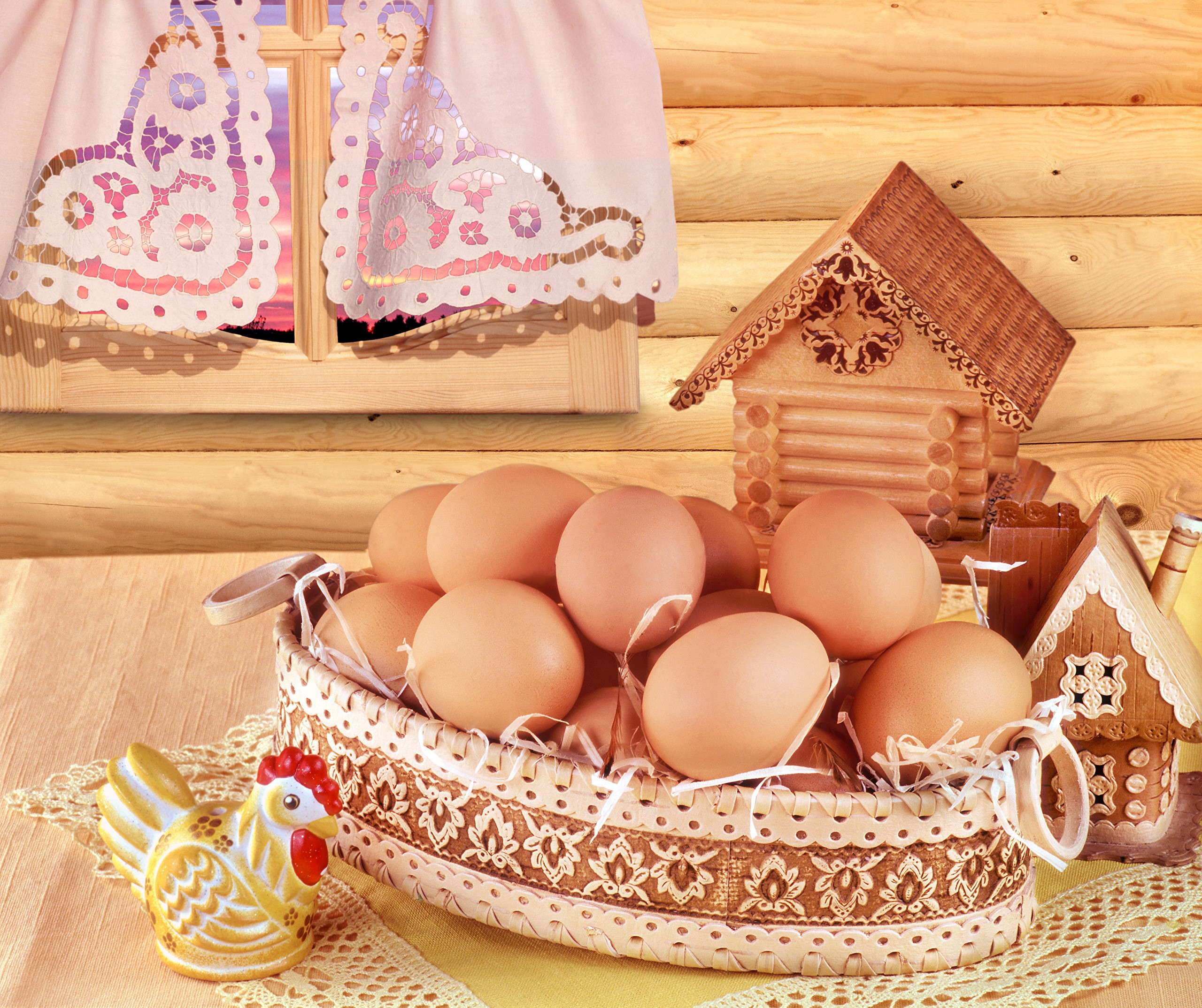 Basket of eggs with wooden houses and chicken figurine HD Wallpaper