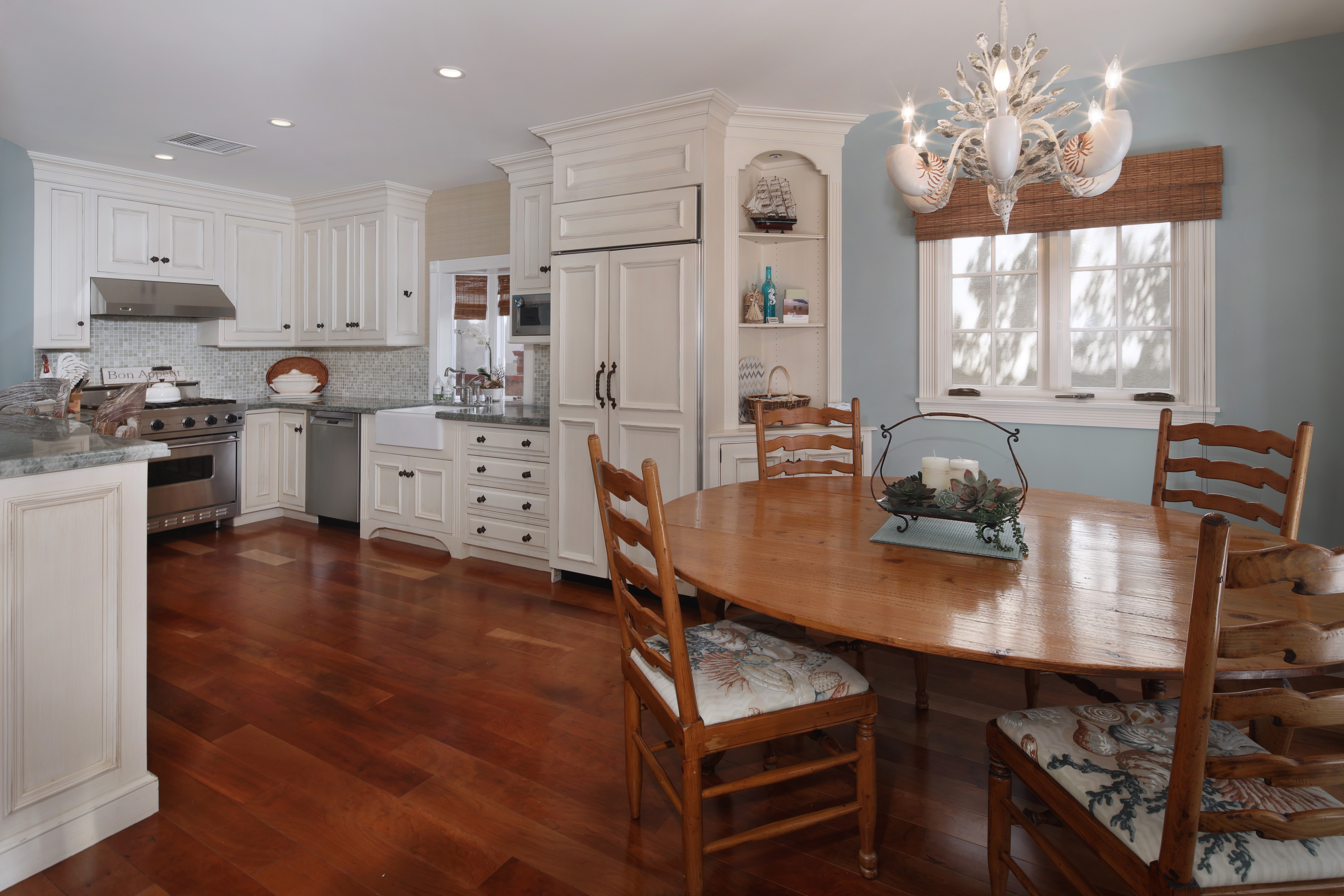 Kitchen with Chandelier, Table, and Chairs HD Wallpaper