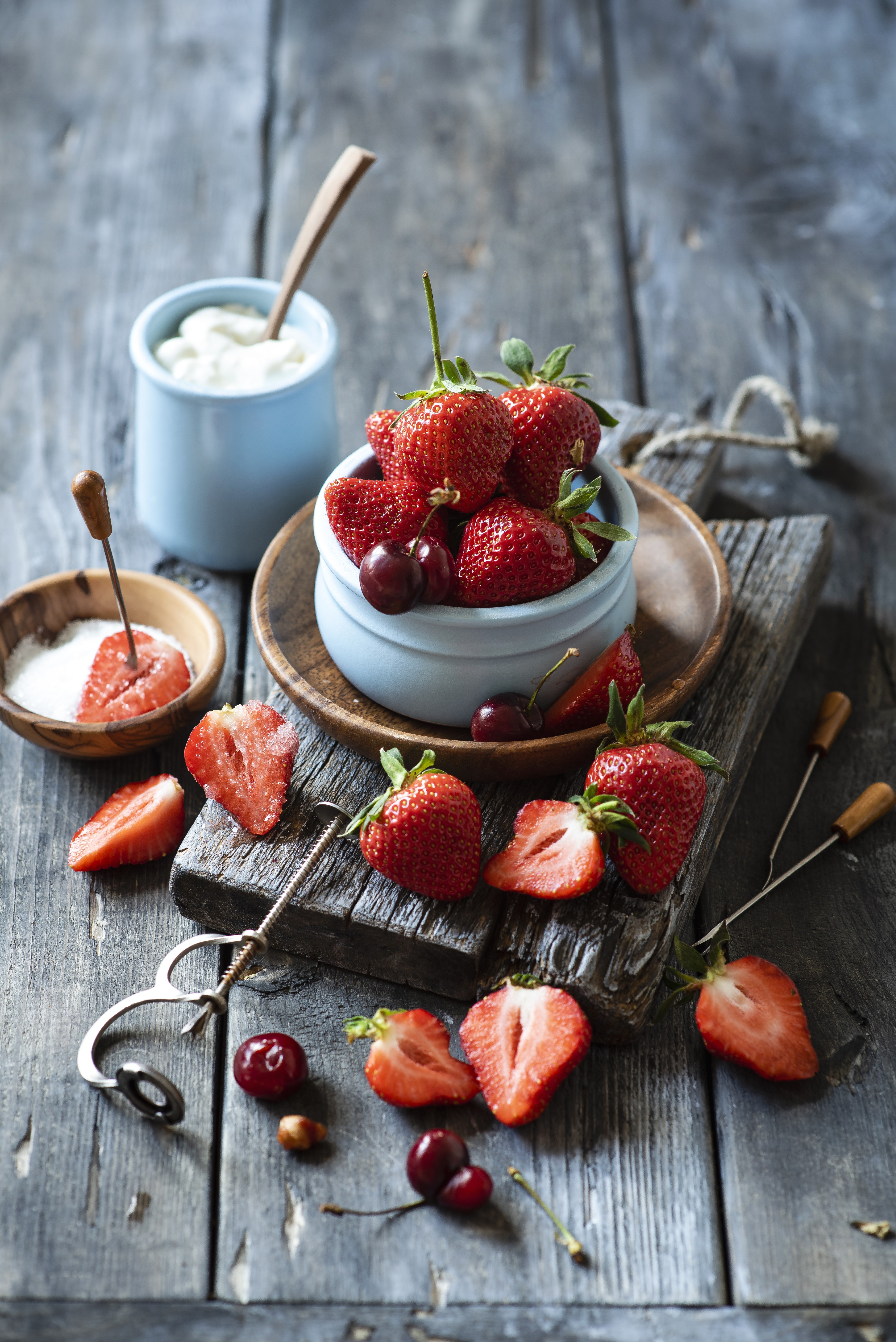 Strawberries and cherries with yogurt on wood planks HD Phone Wallpaper