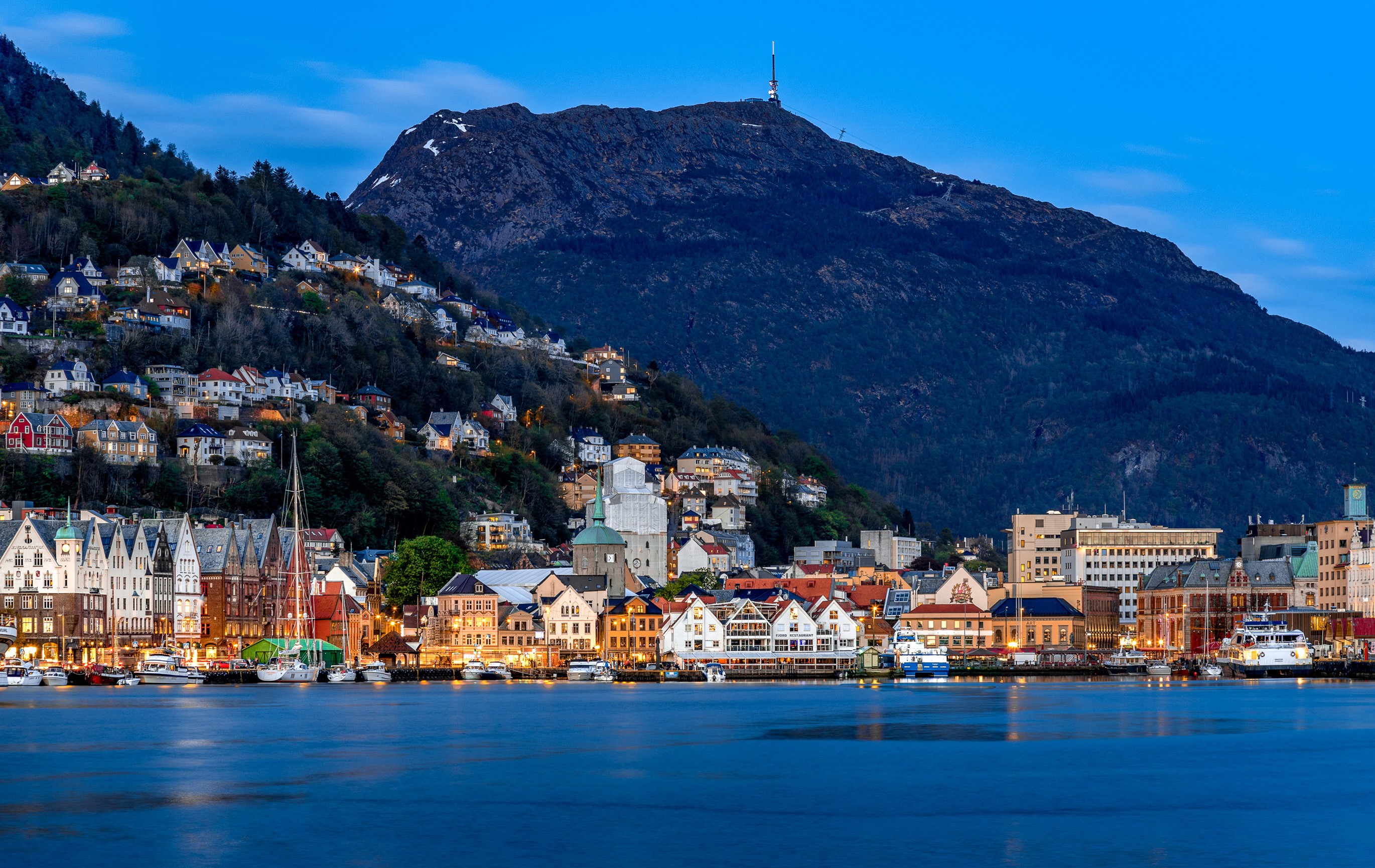 Bergen, Norway waterfront with colorful buildings and mountain backdrop HD Wallpaper