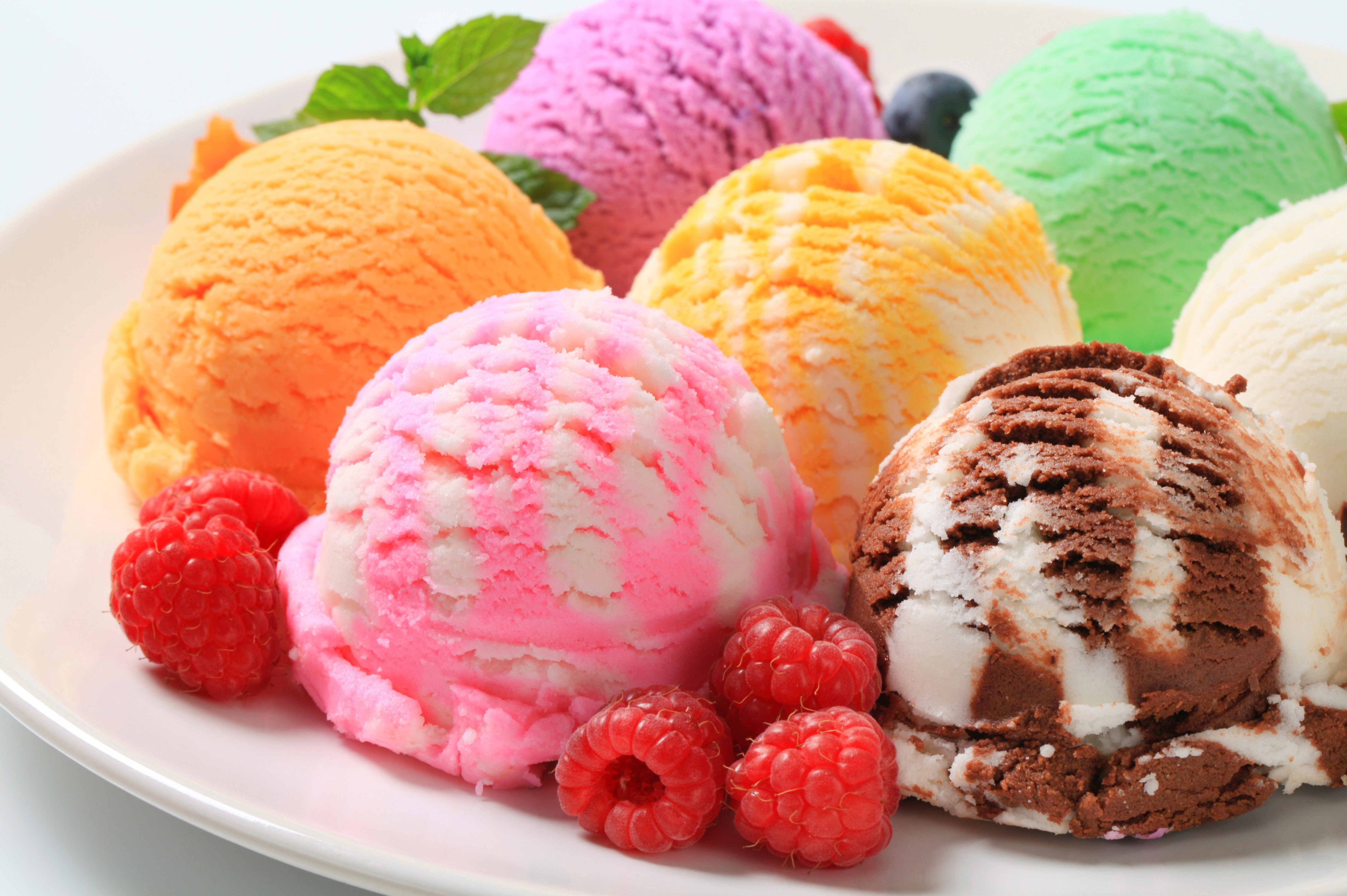 Assorted scoops of ice cream with raspberries HD Wallpaper
