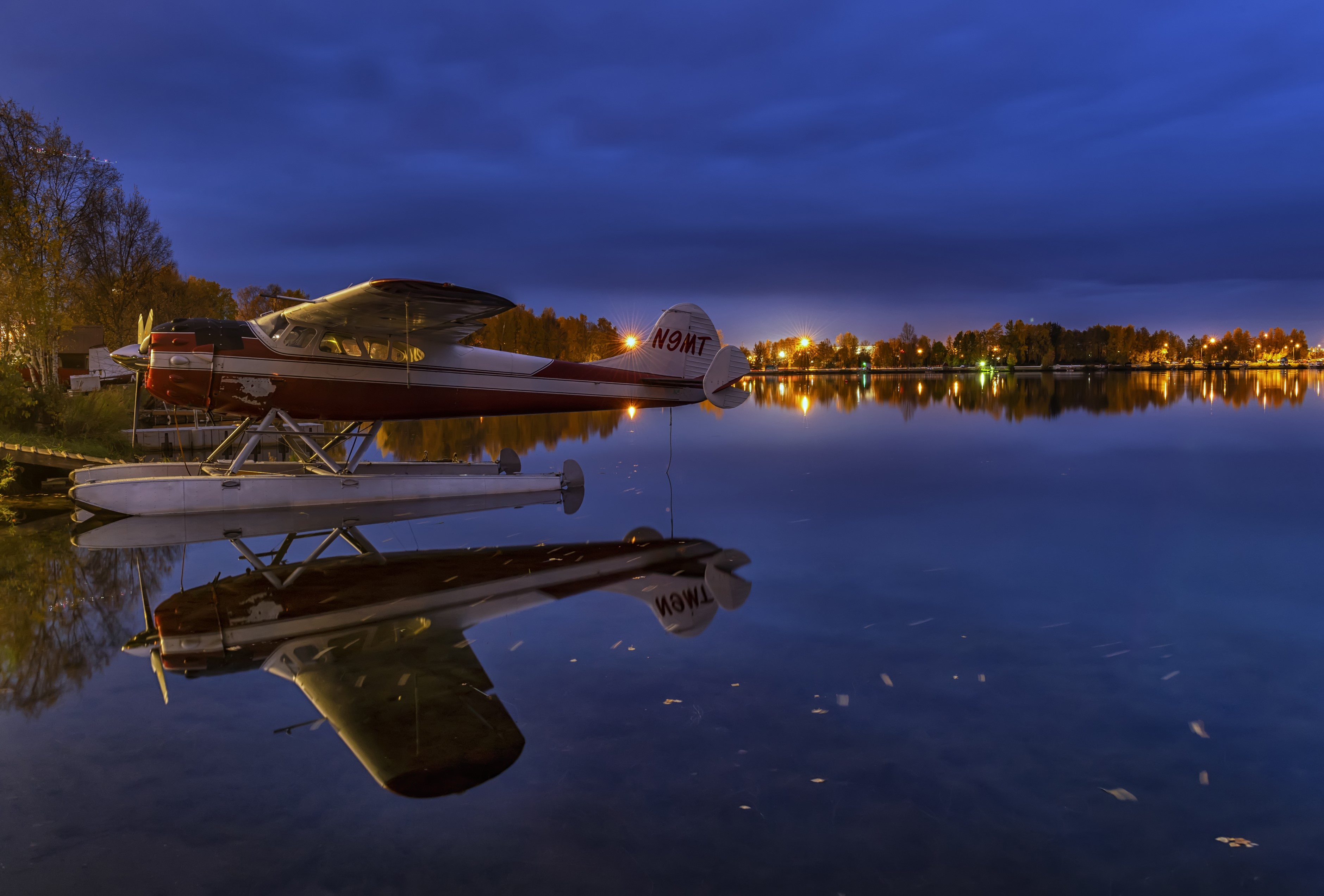 Seaplane on Lake Spenard in Anchorage, Alaska at dusk HD Wallpaper