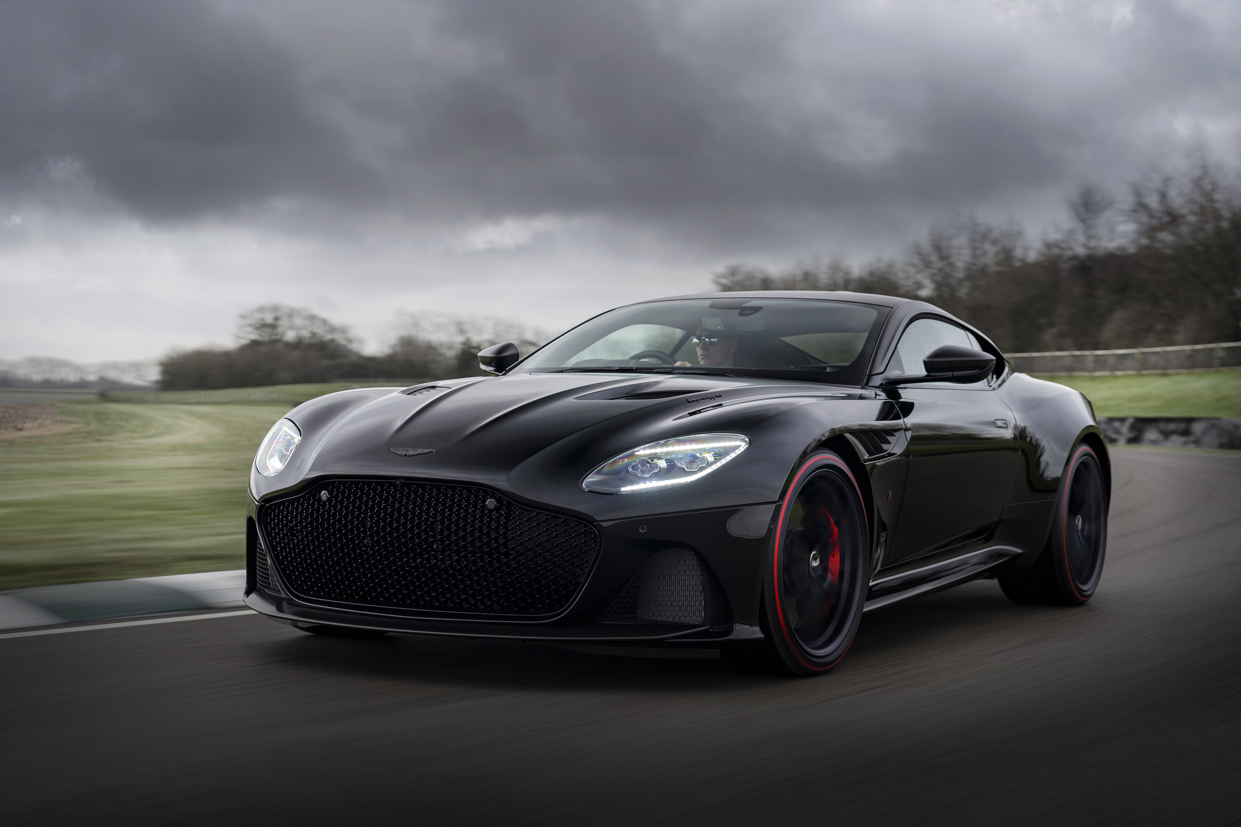 Black 2019 Aston Martin DBS Superleggera TAG Heuer Edition in motion HD Wallpaper