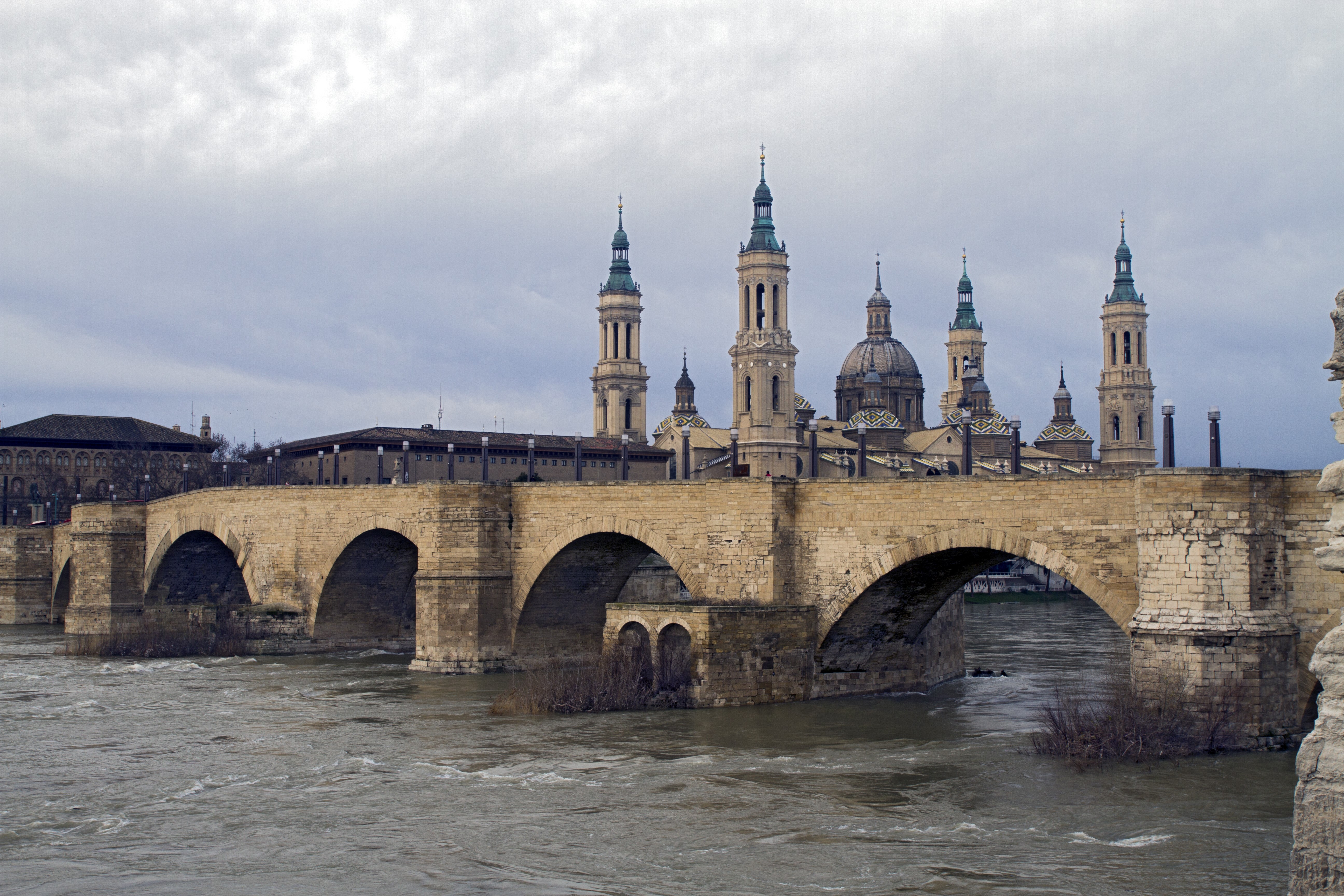 Puente de Piedra over Ebro River with Cathedral-Basilica of Our Lady of the Pillar, Saragossa, Spain HD Wallpaper