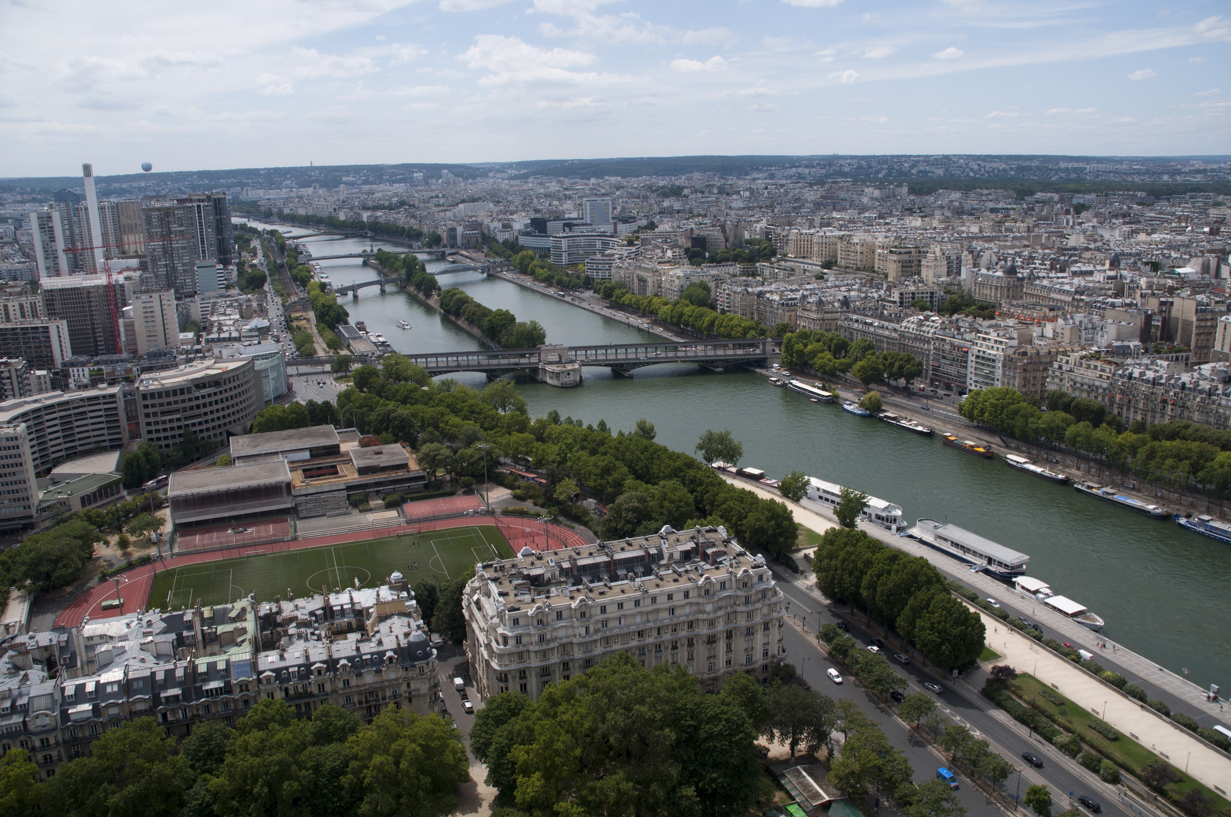 Aerial view of Paris with the Seine River and bridges HD Wallpaper
